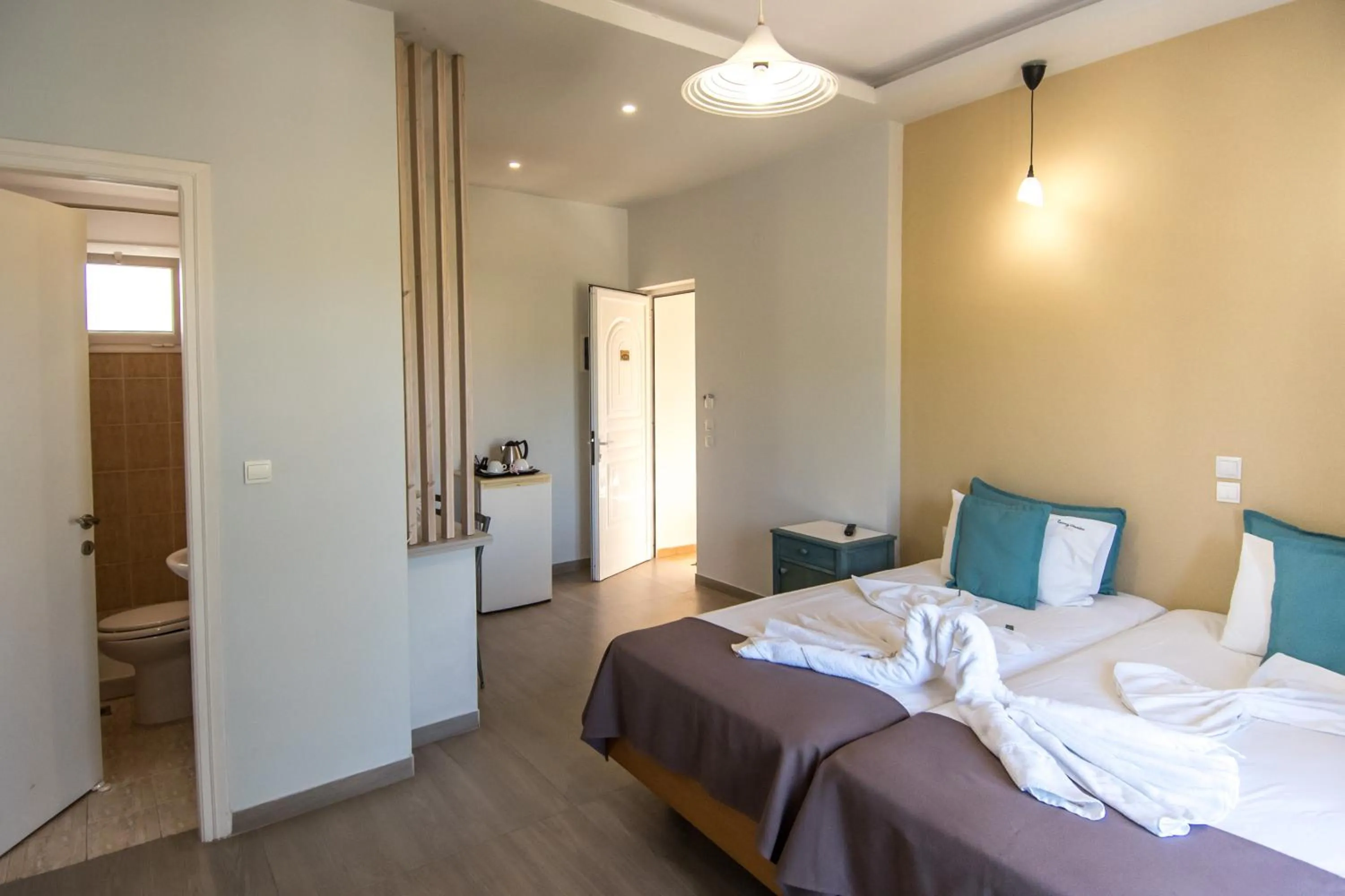 Bed in Sunny Garden Hotel