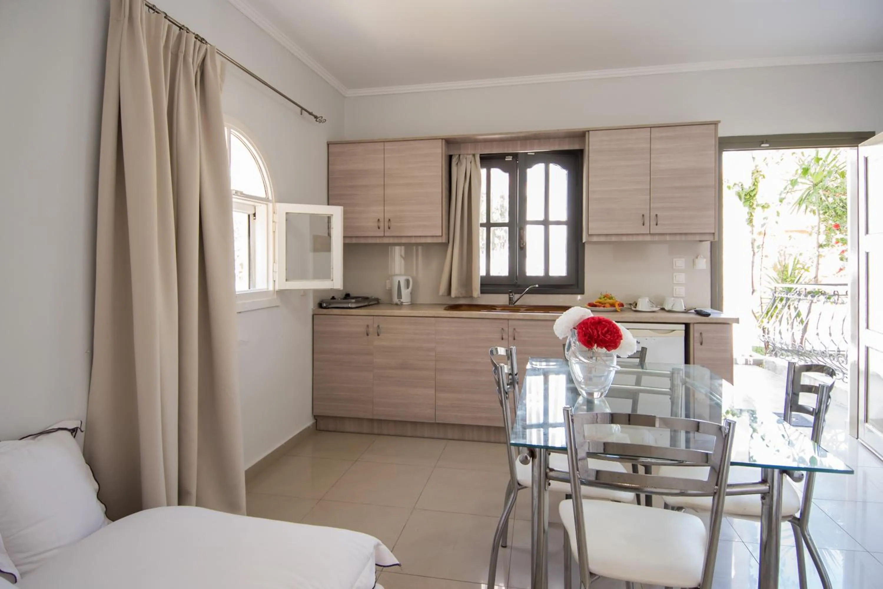Kitchen or kitchenette in Sunny Garden Hotel