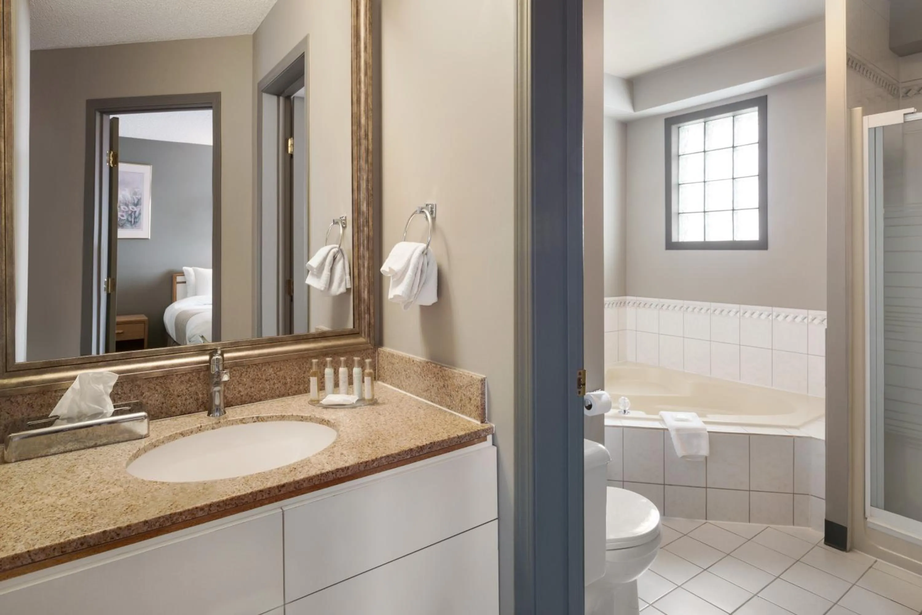 Bathroom in Travelodge by Wyndham Edmonton Airport