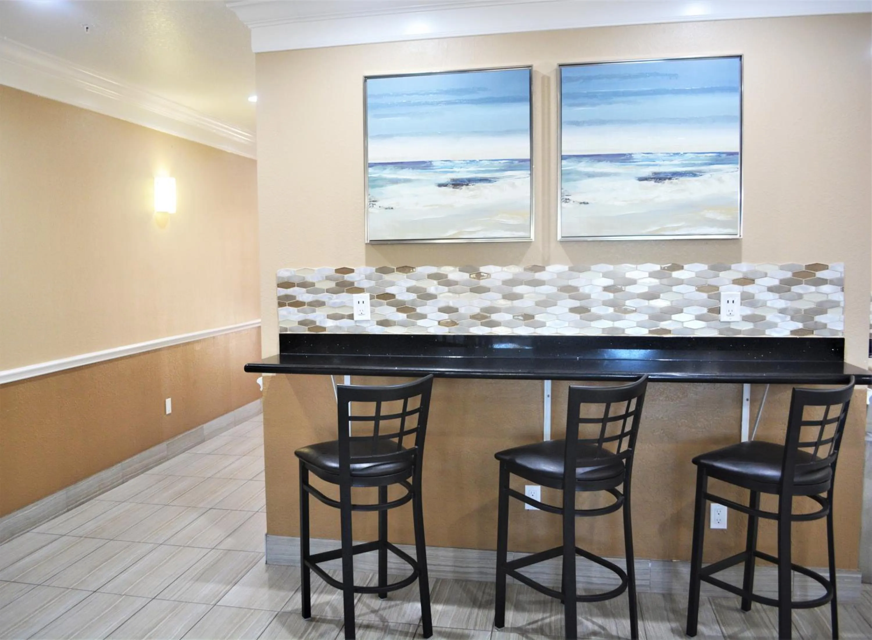 Seating area in Super 8 by Wyndham Galveston