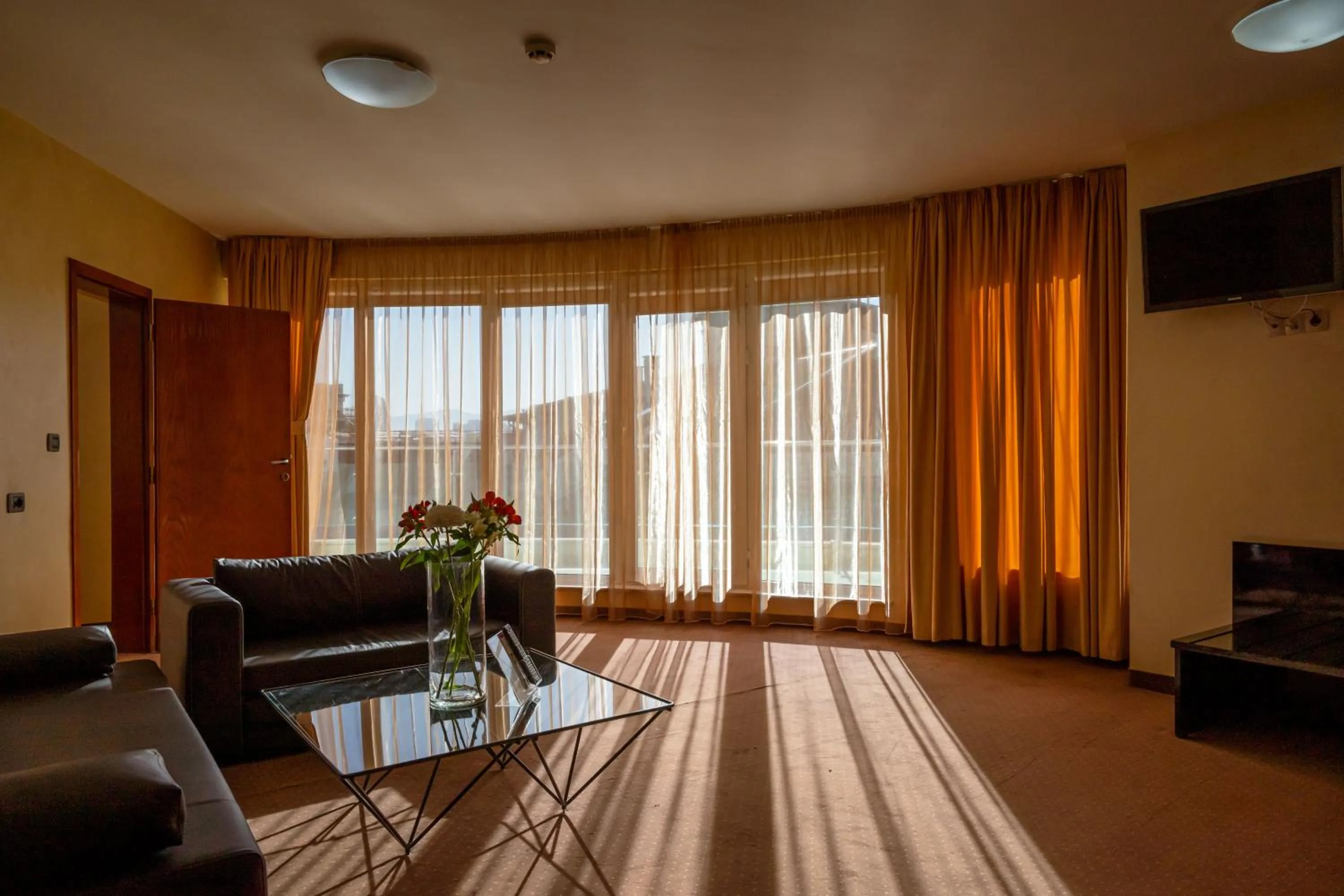 Communal lounge/ TV room in Europe Hotel