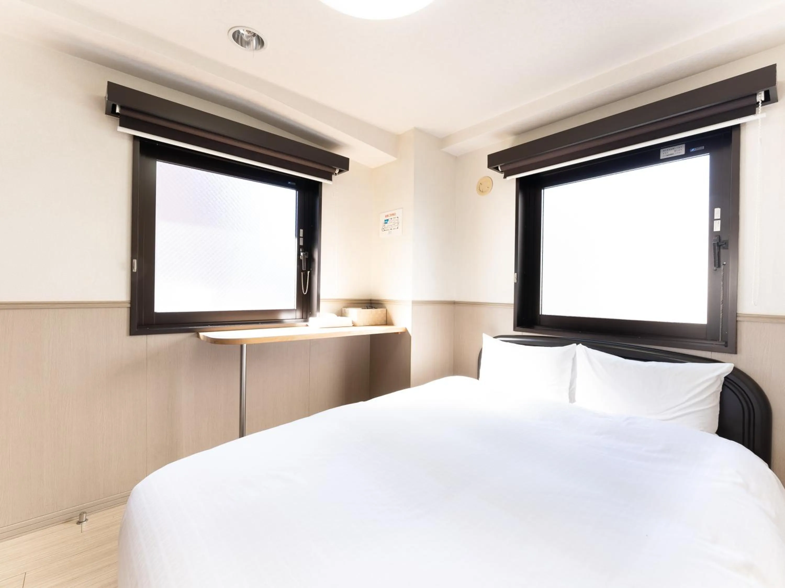 Bed in Chang Tee Hotel Ikebukuro