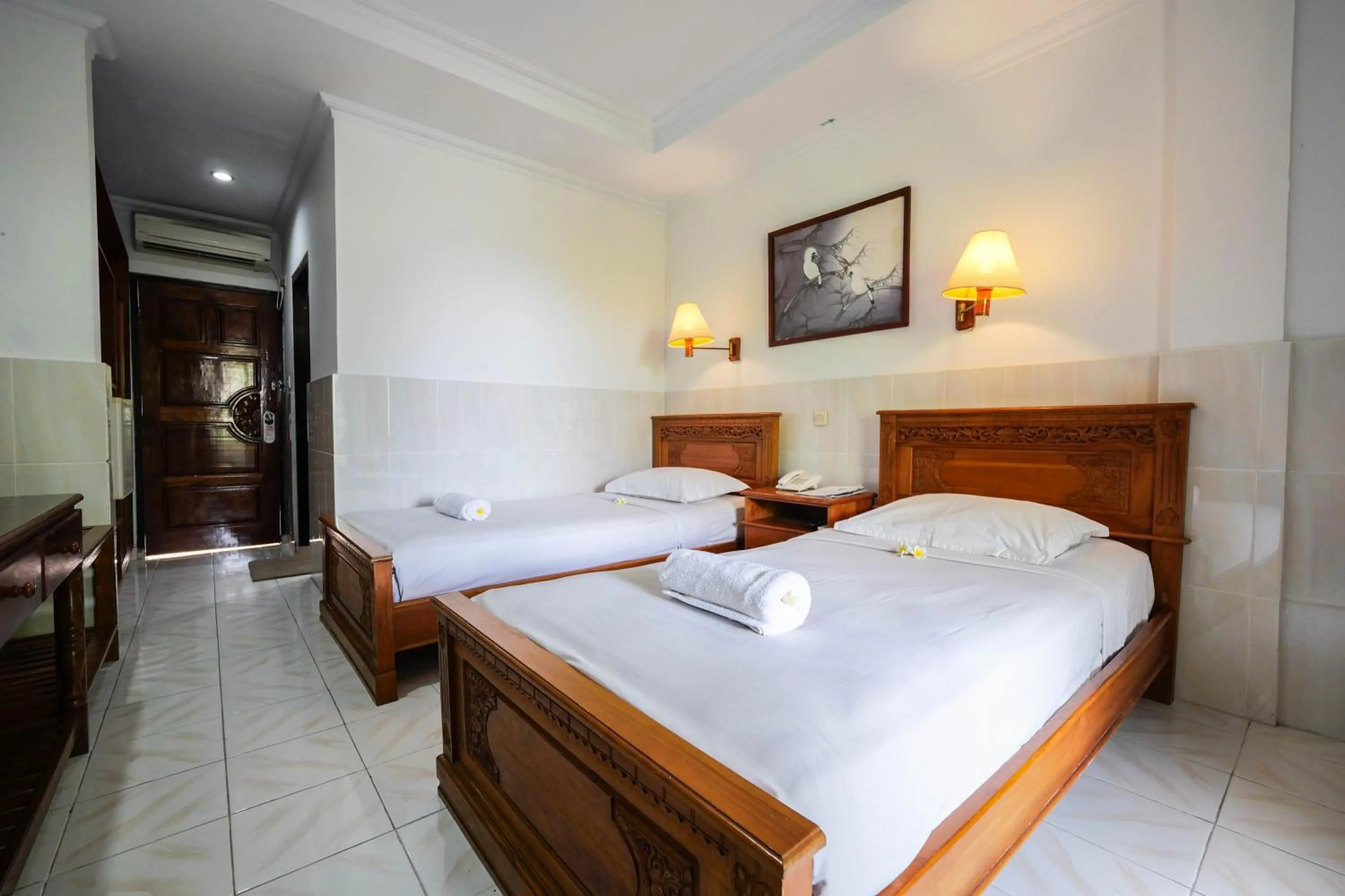 Bed in Palm Beach Hotel Bali