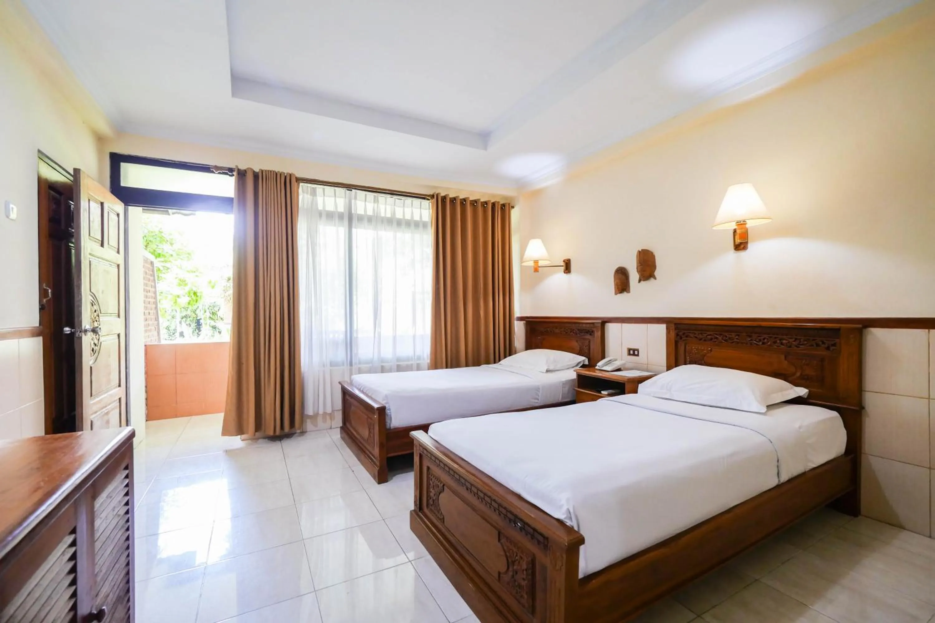Bed in Palm Beach Hotel Bali