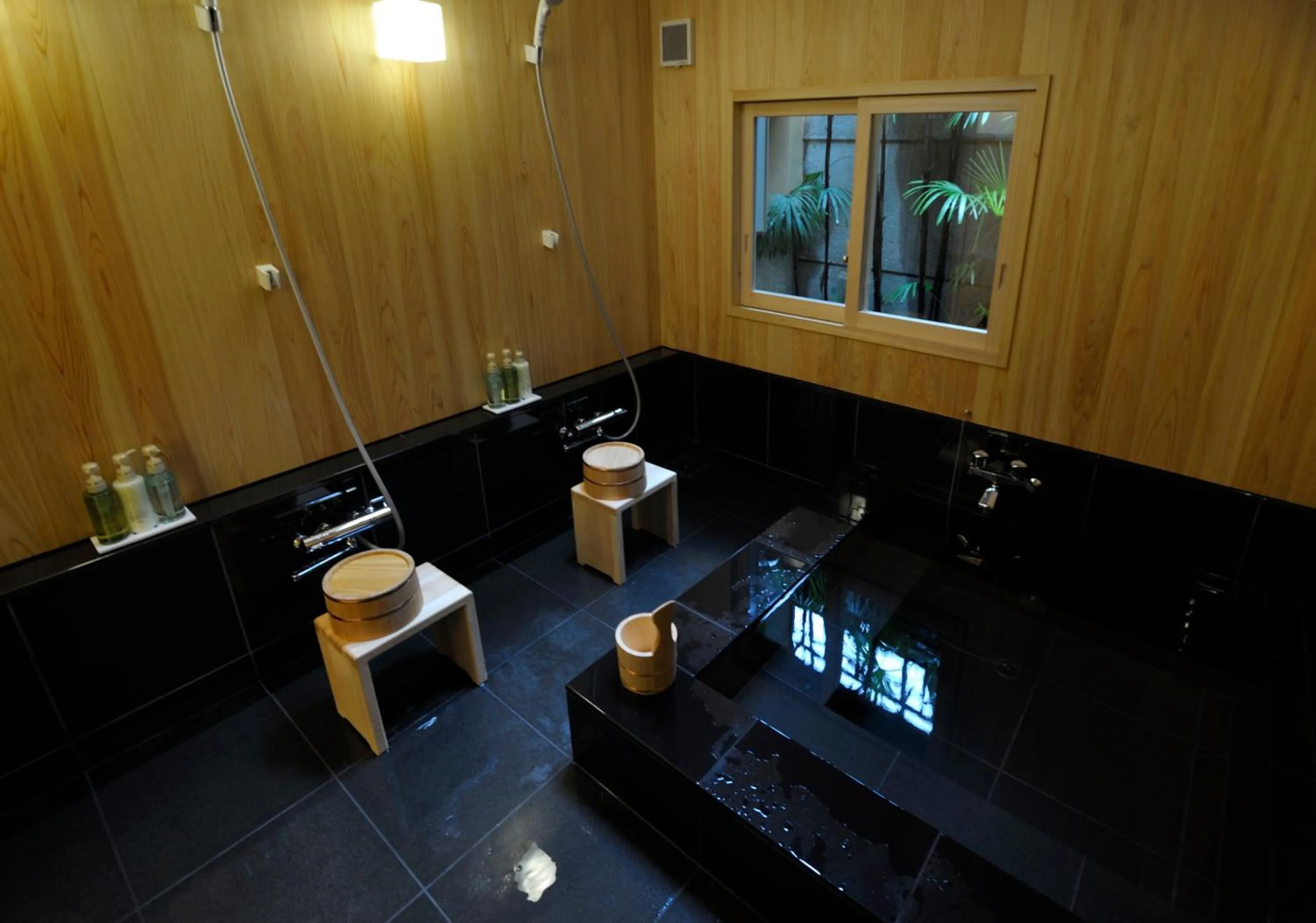 Bathroom in IZUYASU Traditional Kyoto Inn serving Kyoto cuisine