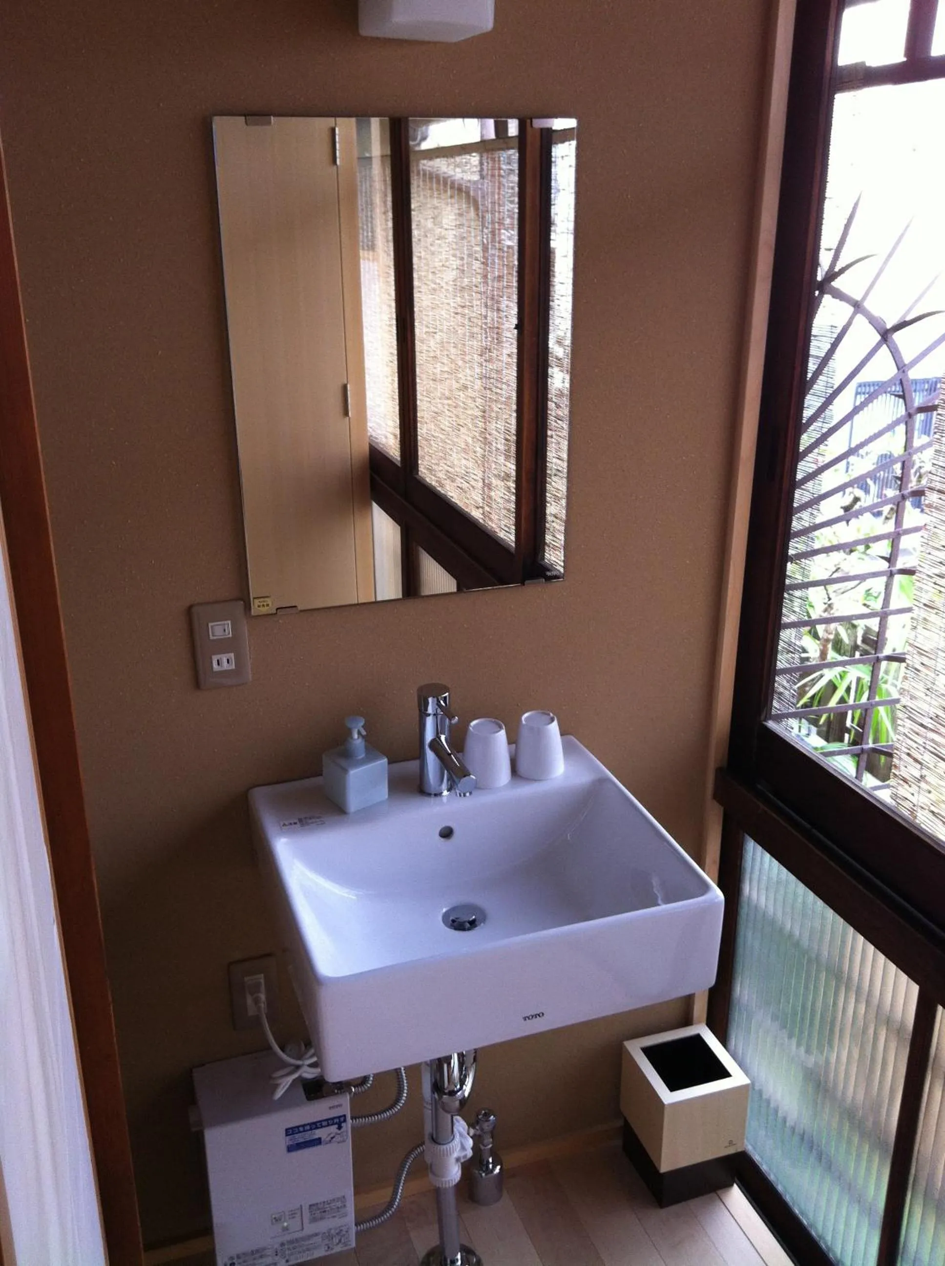 Bathroom in IZUYASU Traditional Kyoto Inn serving Kyoto cuisine