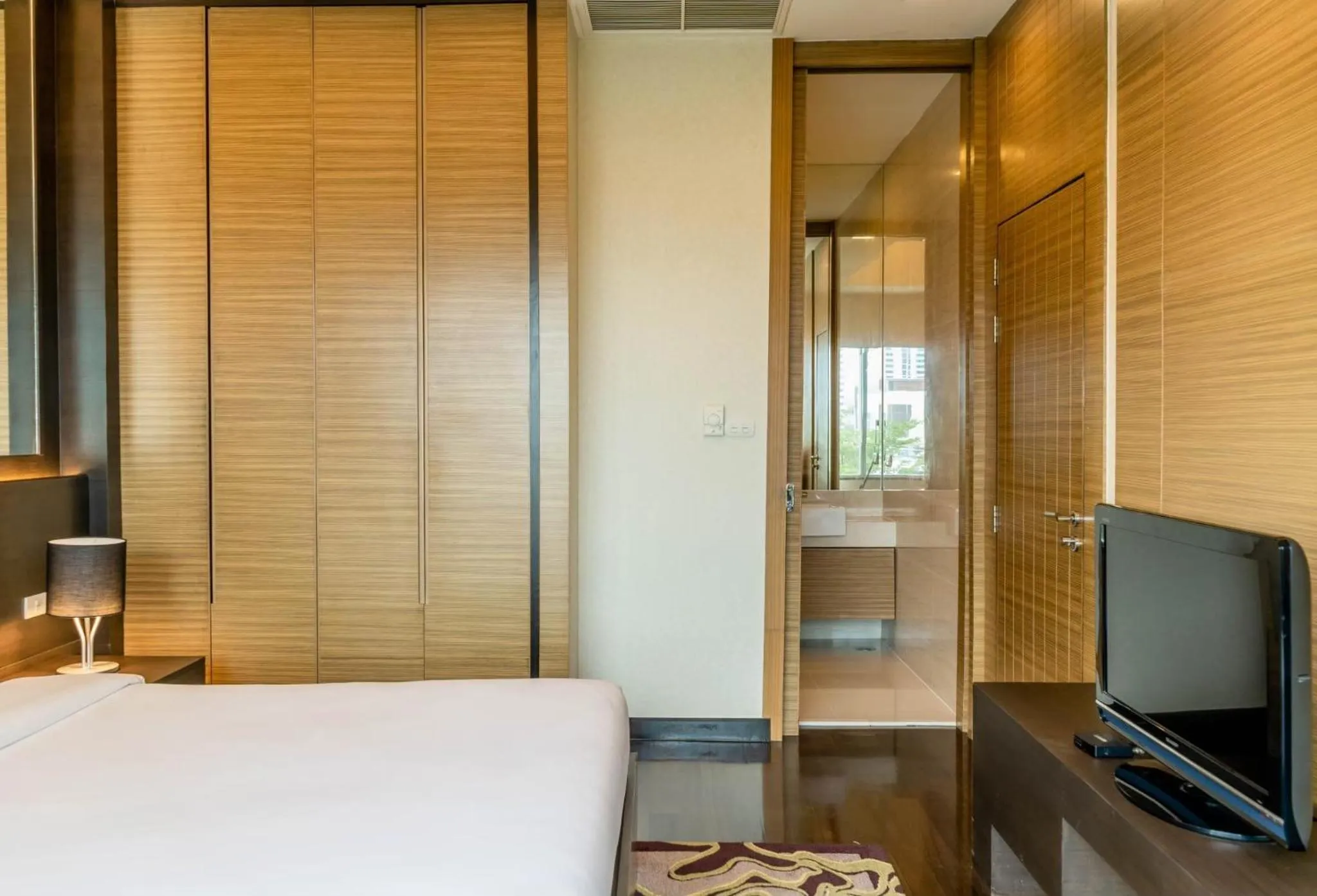 Bed in Jasmine Resort Bangkok