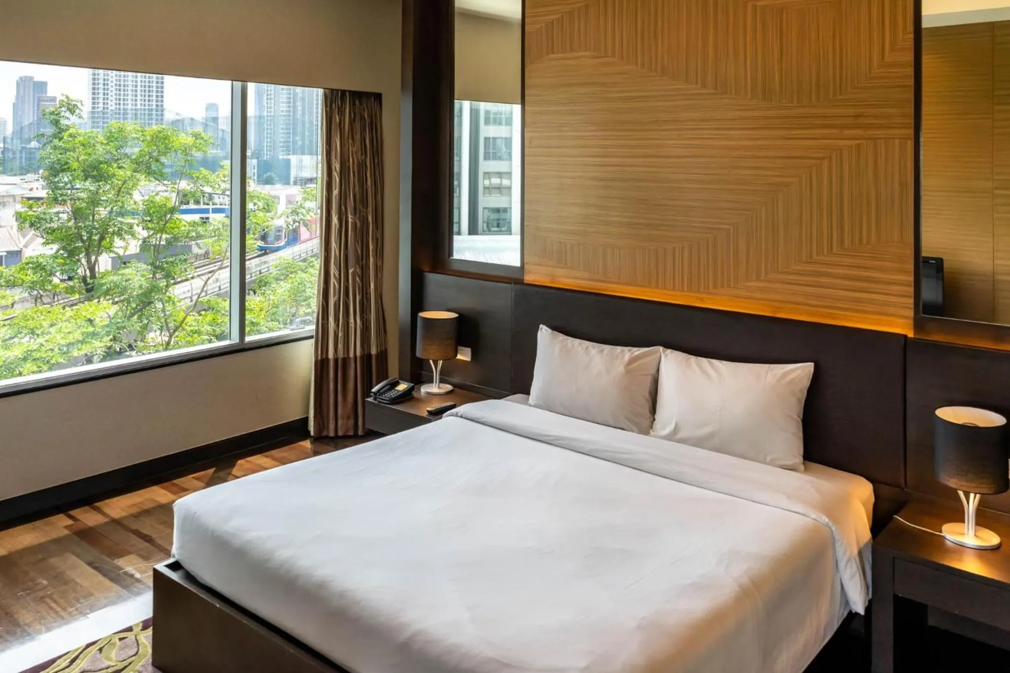 Bed in Jasmine Resort Bangkok