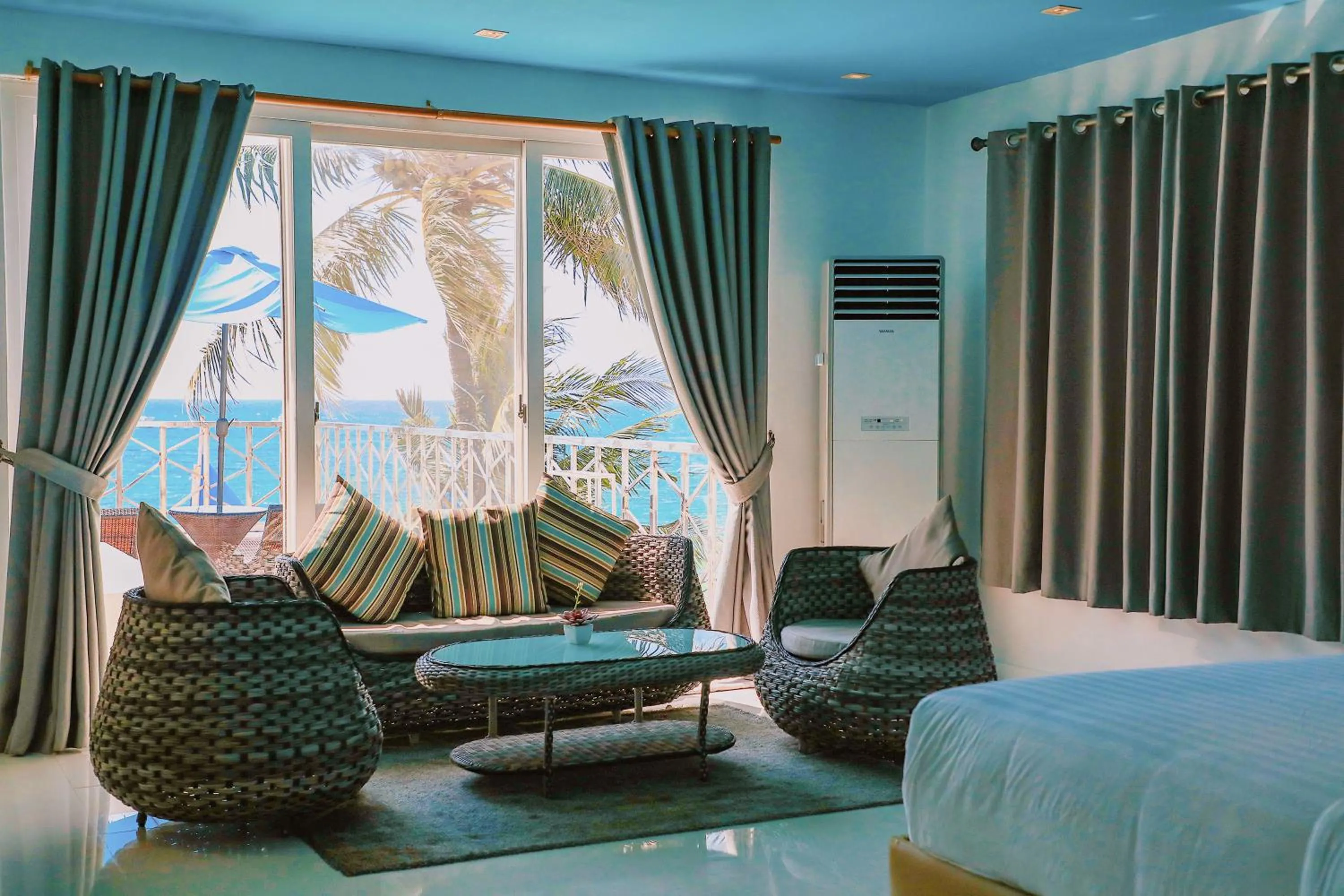 Living room, Bed in Boracay Ocean Club Beach Resort
