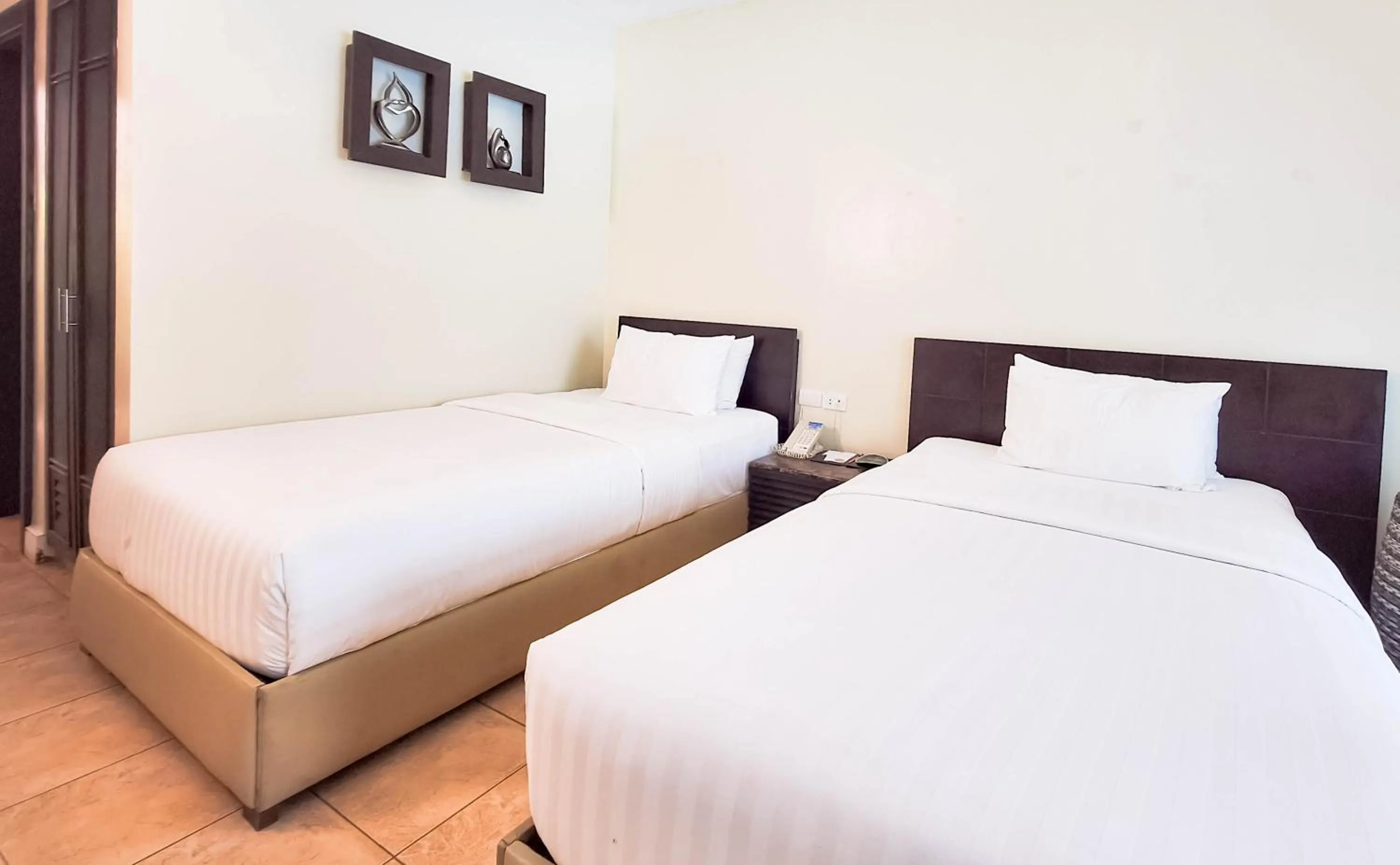 Bed in Boracay Ocean Club Beach Resort