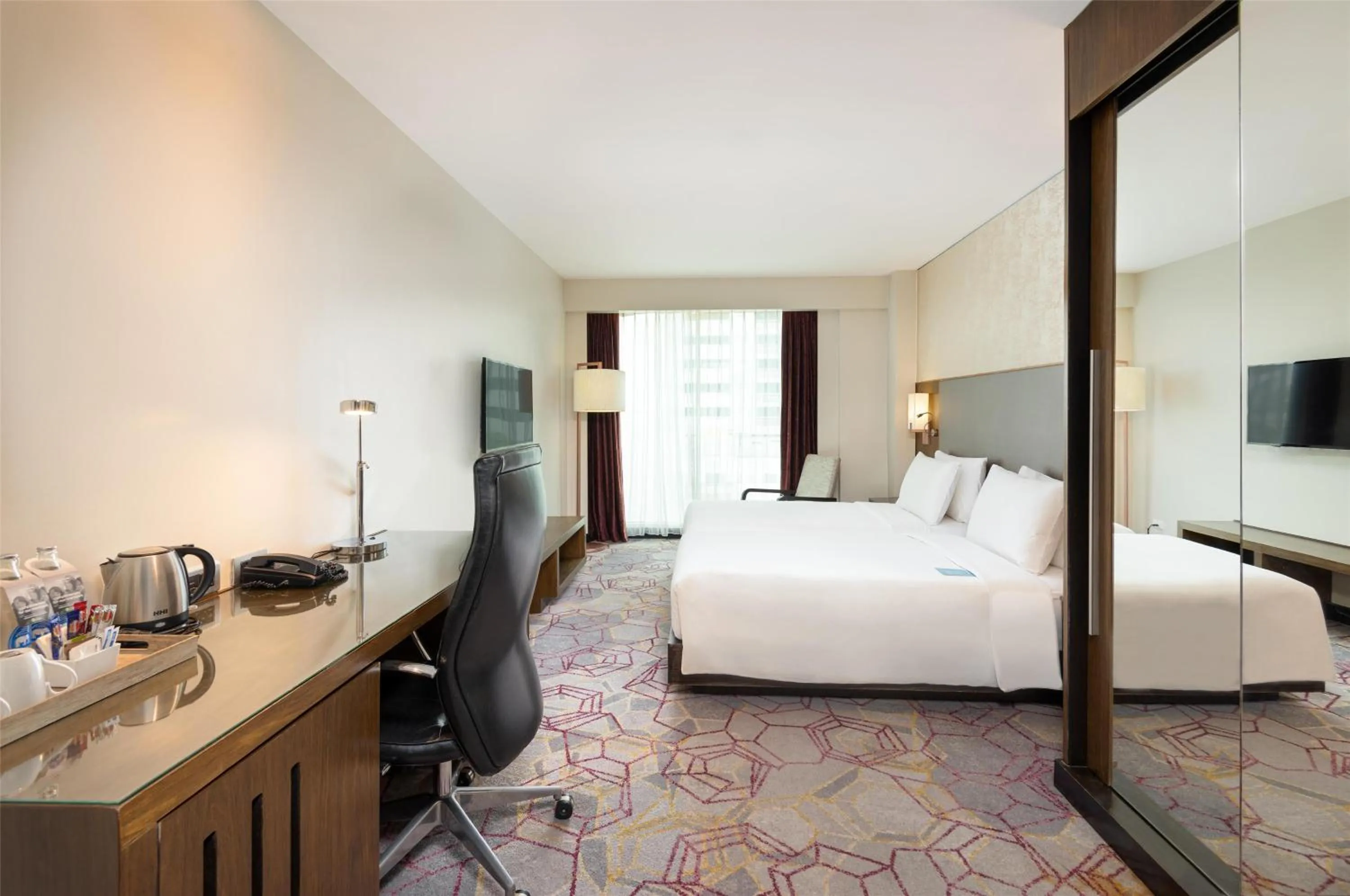 Photo of the whole room, Bed in Radisson Suites Bangkok Sukhumvit