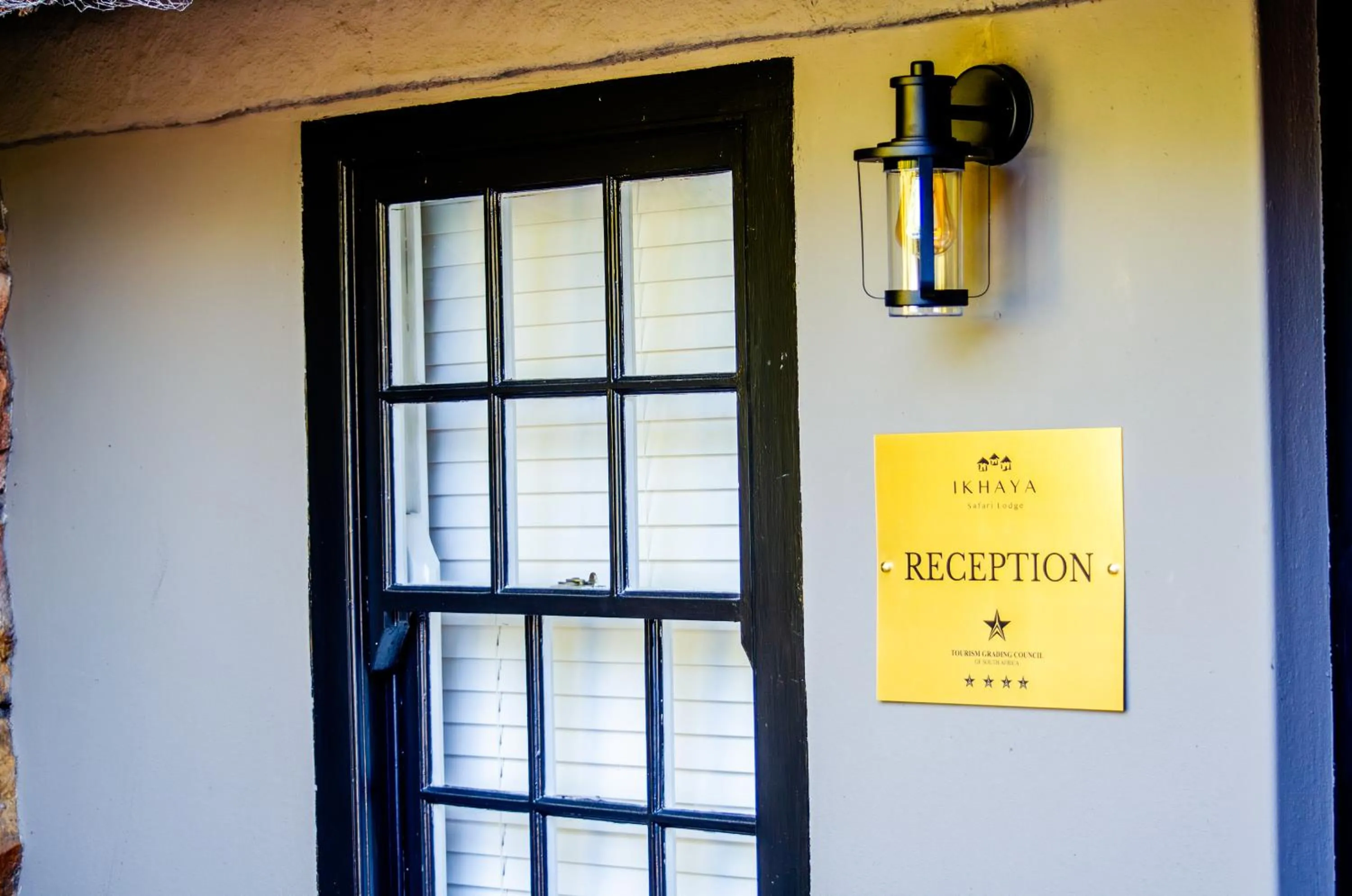 Property logo or sign in Ikhaya Safari Lodge