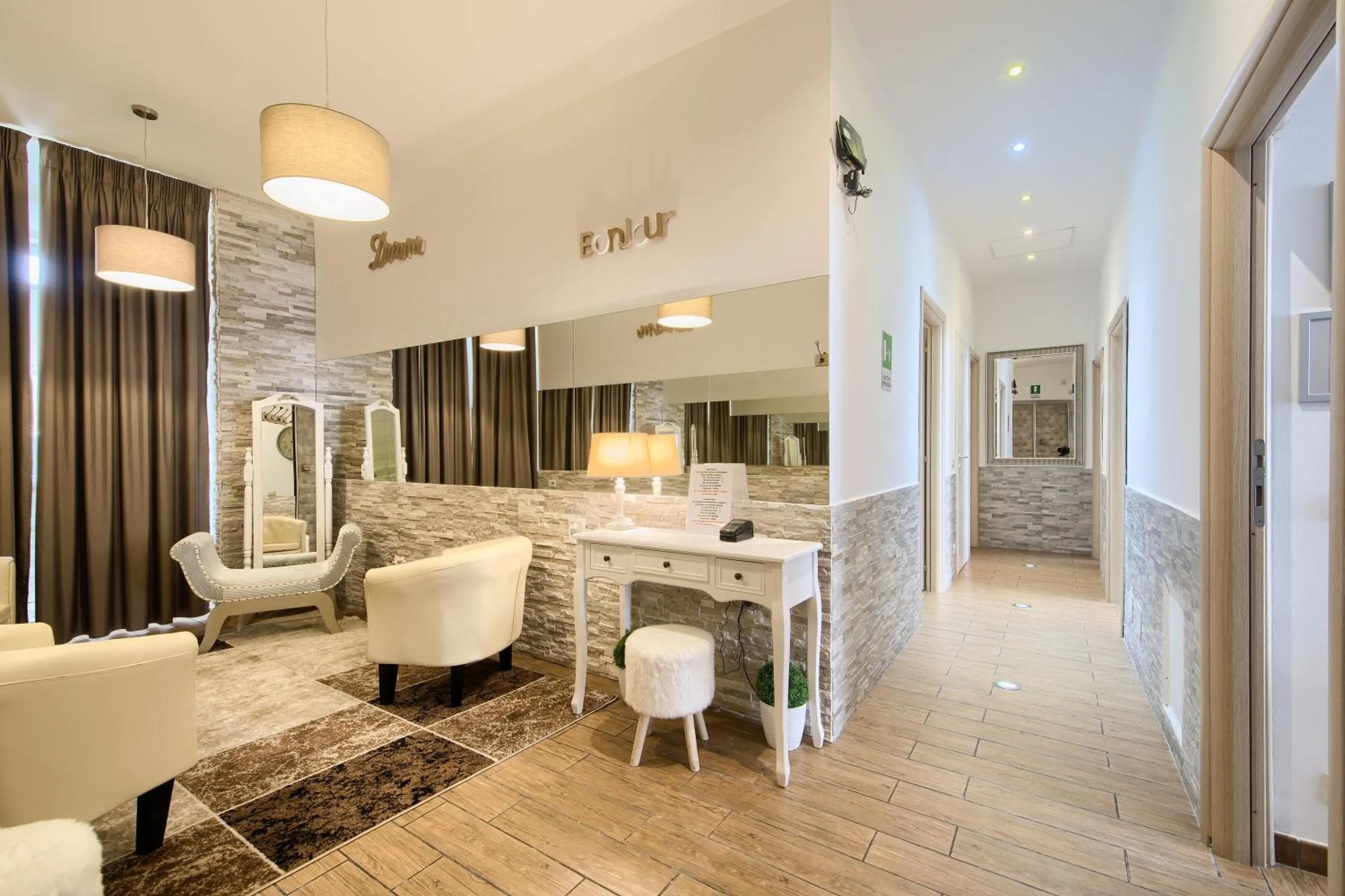 Communal lounge/ TV room in Domus Pietro Inn