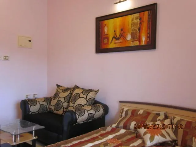 Bed in AF-6 Candolim with shared pool
