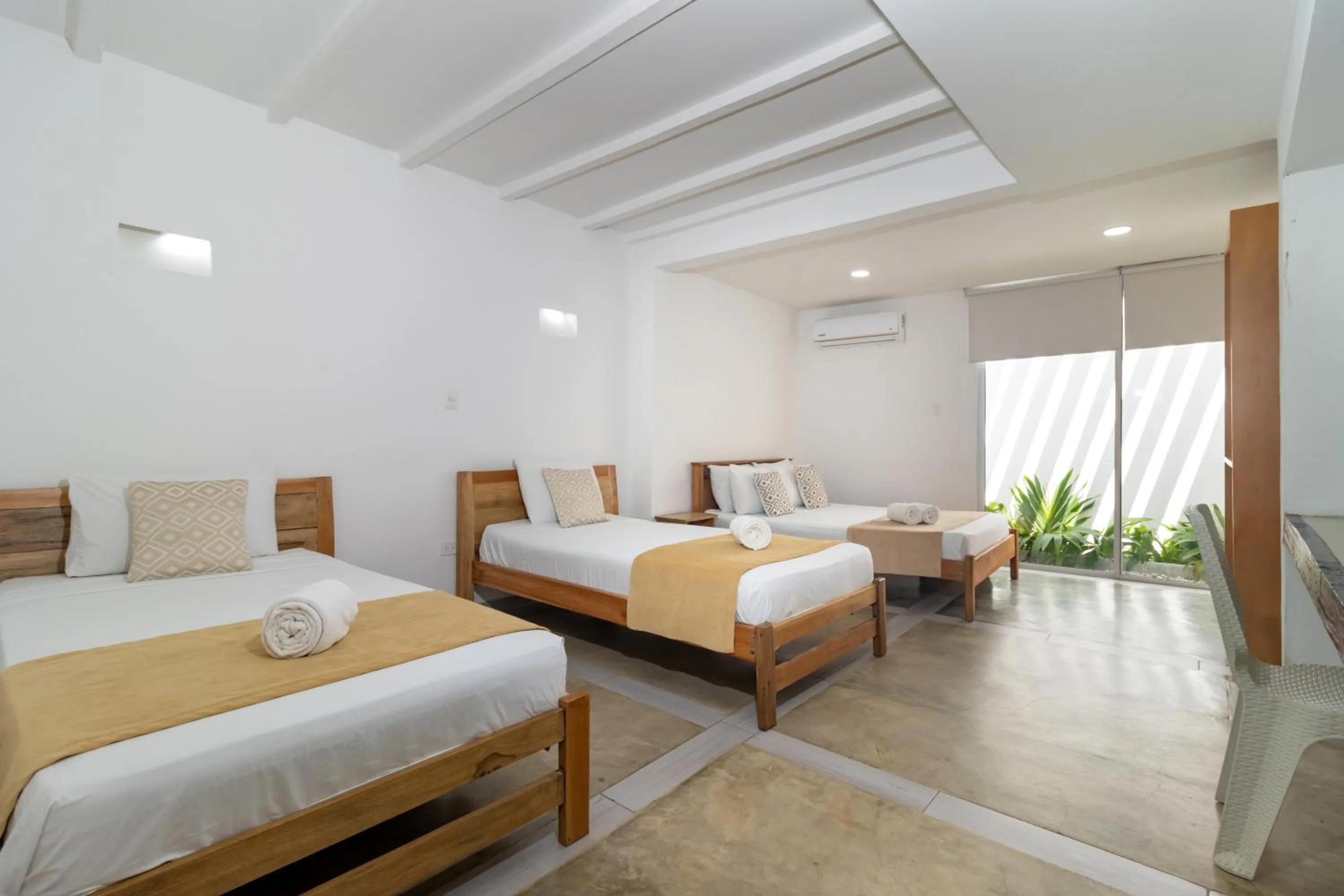 Property building, Bed in Hotel Sansiraka Suites By GEH Suites