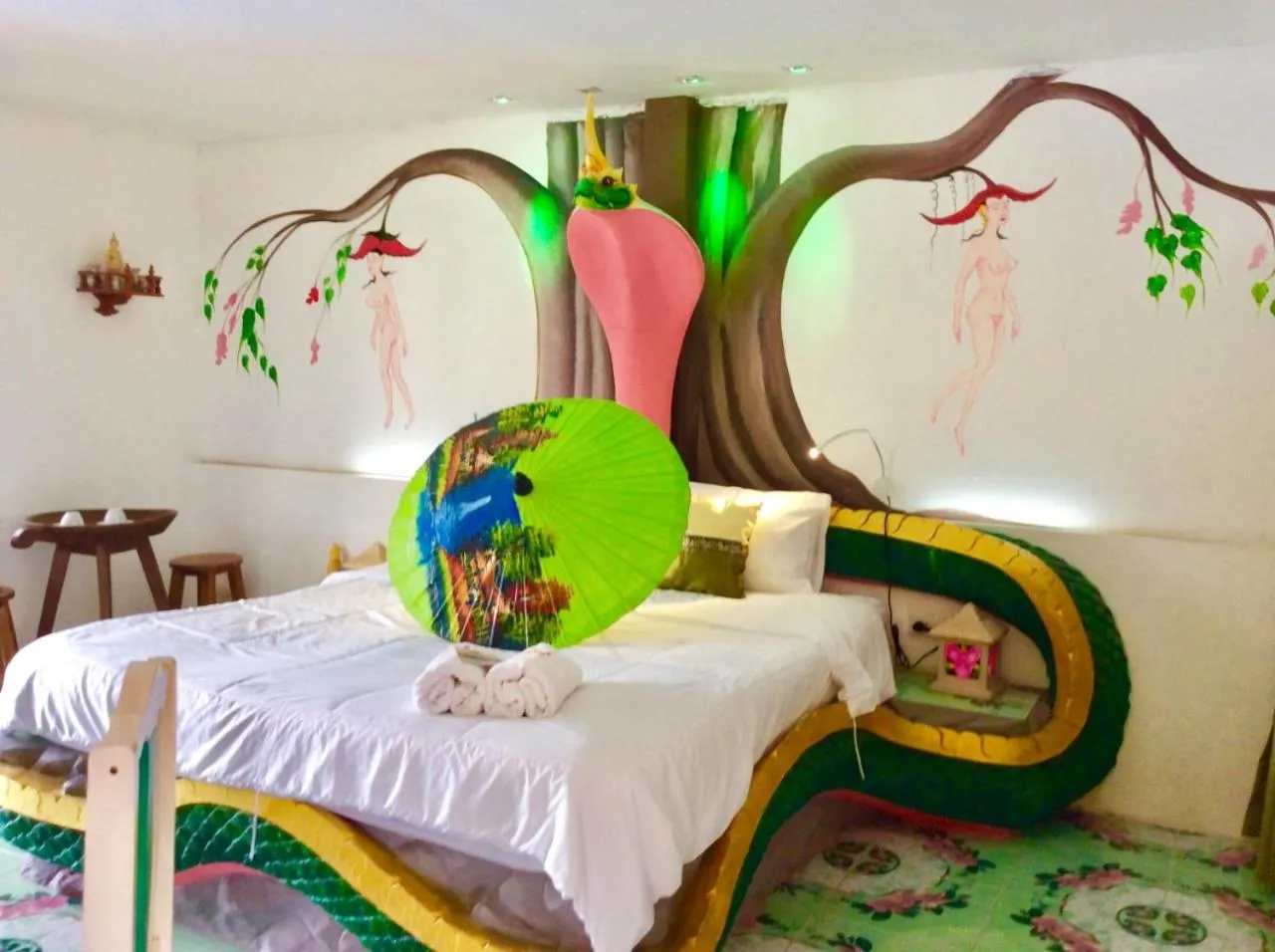 Bed in The Orchid Resort & Relax