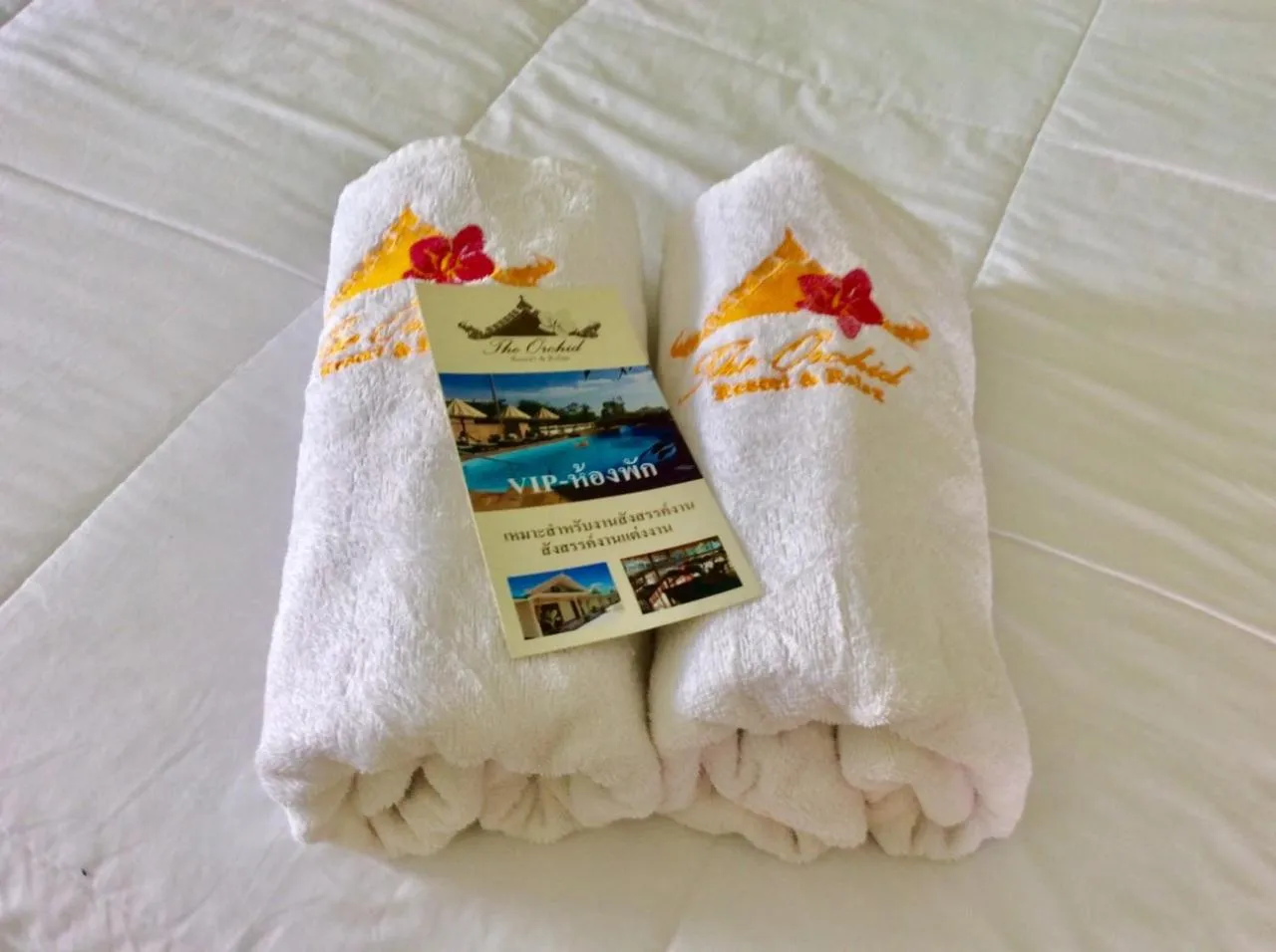 Bed in The Orchid Resort & Relax