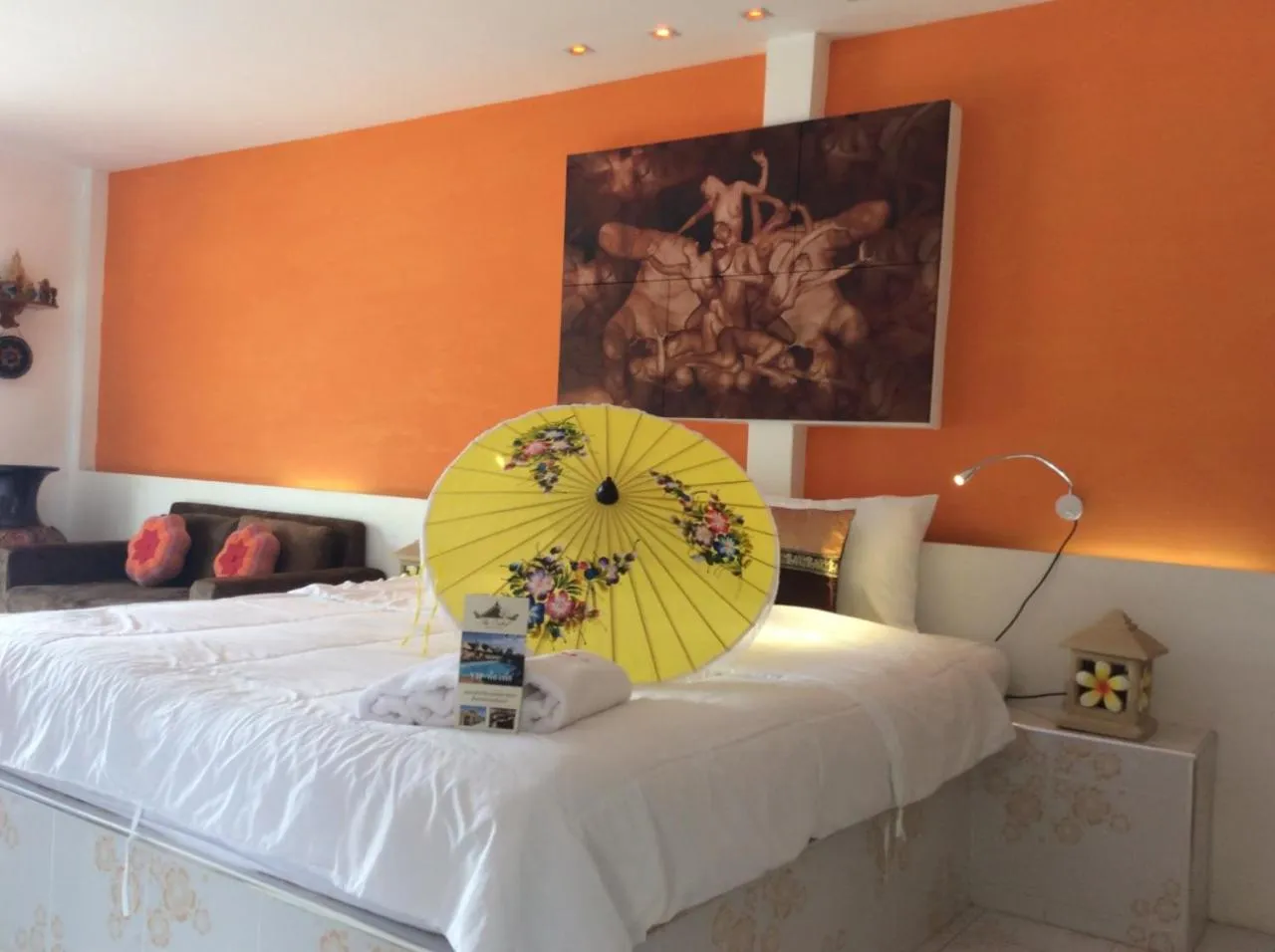 Bed in The Orchid Resort & Relax