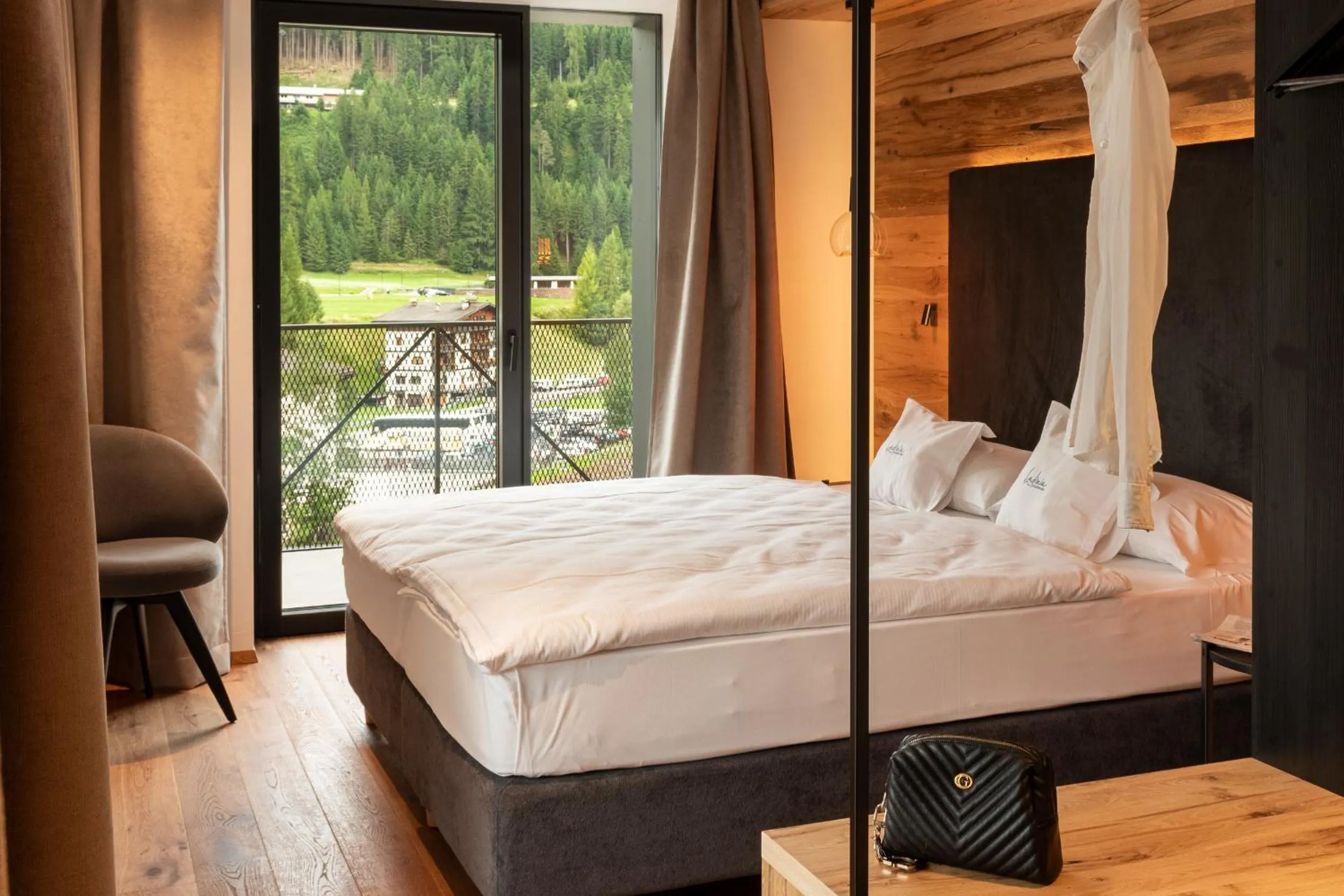 Bedroom, Bed in Ladinia Dolomites View - Adults Only