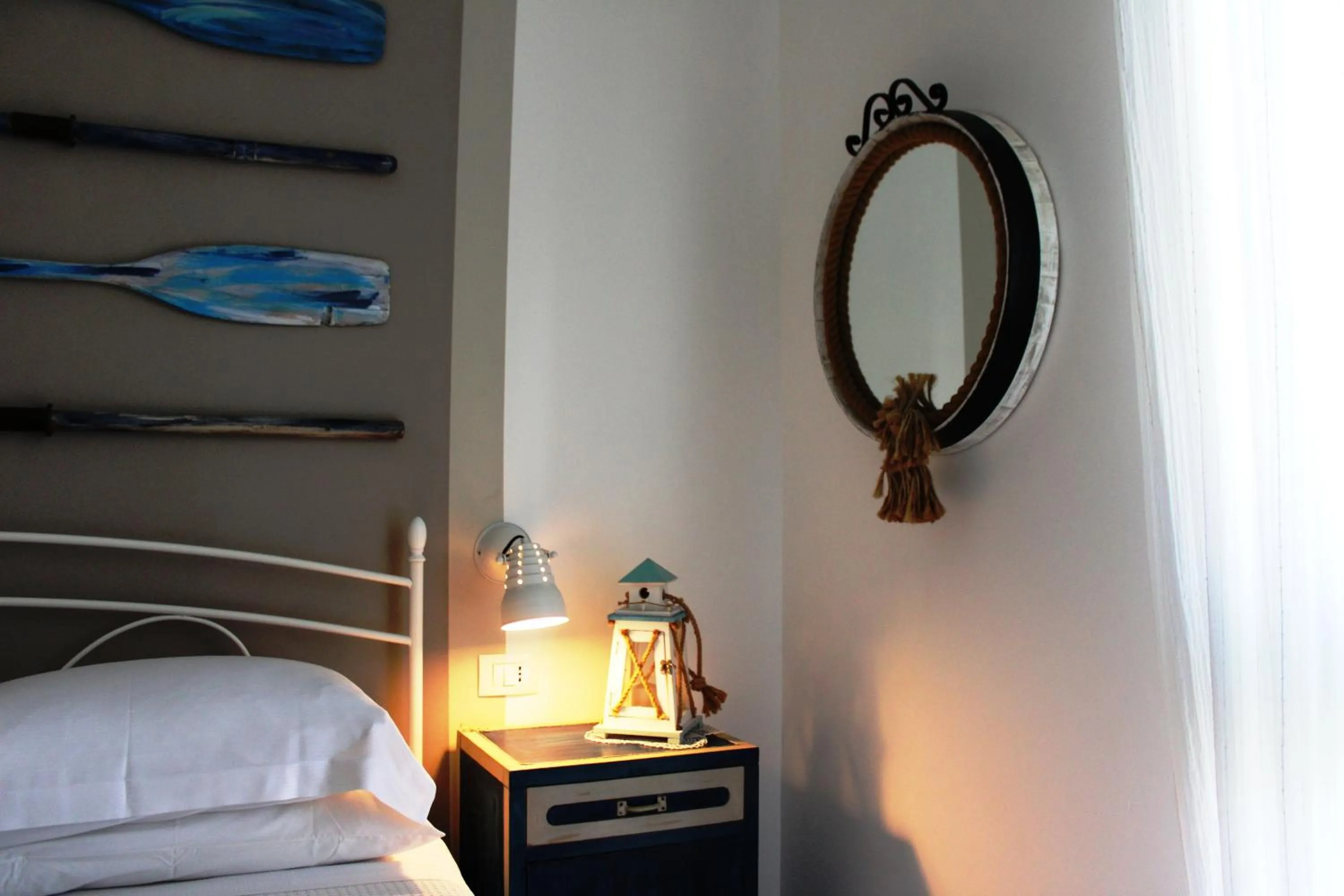 Bed in B&B Casa del Faro SanVallero Adults Only