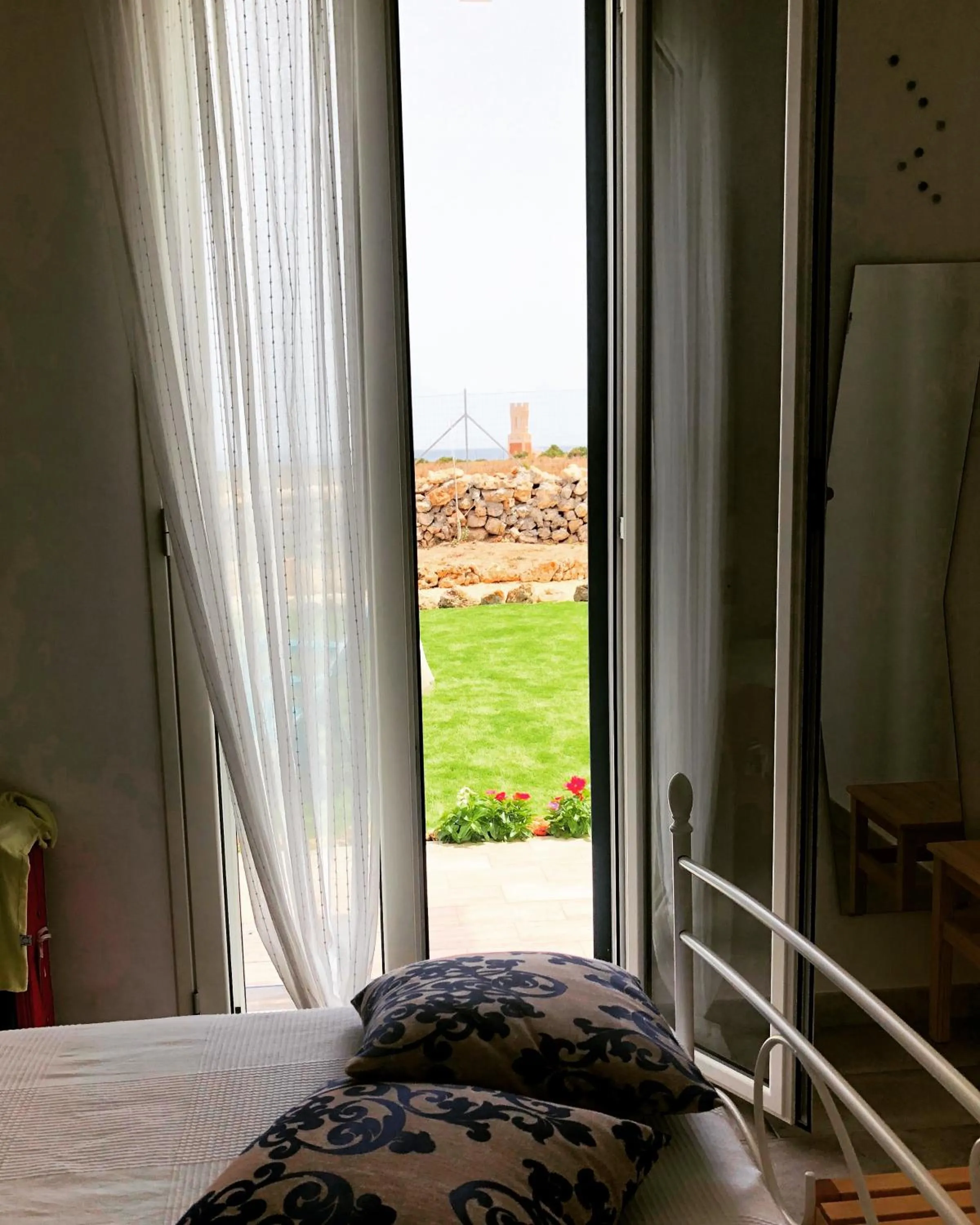 Bed in B&B Casa del Faro SanVallero Adults Only