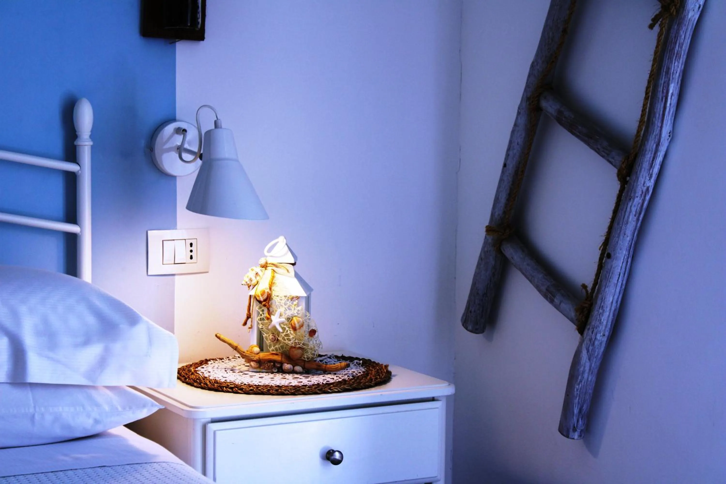 Bed in B&B Casa del Faro SanVallero Adults Only