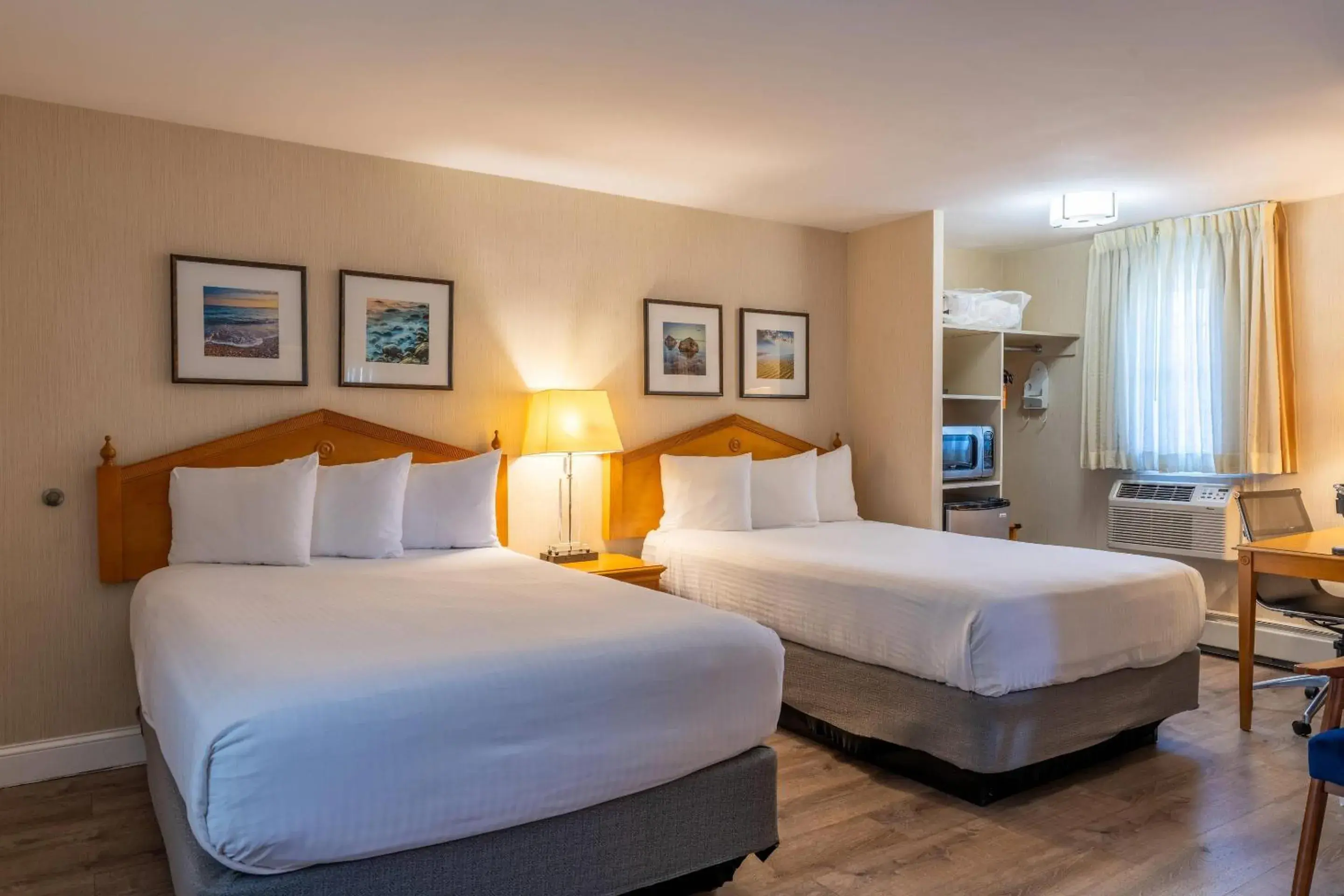 Queen Room with One Queen Bed and Two Double Beds - Non Smoking in Port Inn and Suites Portsmouth, an Ascend Collection Hotel Queen Room with One Queen Bed and Two Double Beds - Non Smoking in Port Inn and Suites Portsmouth, an Ascend Collection Hotel