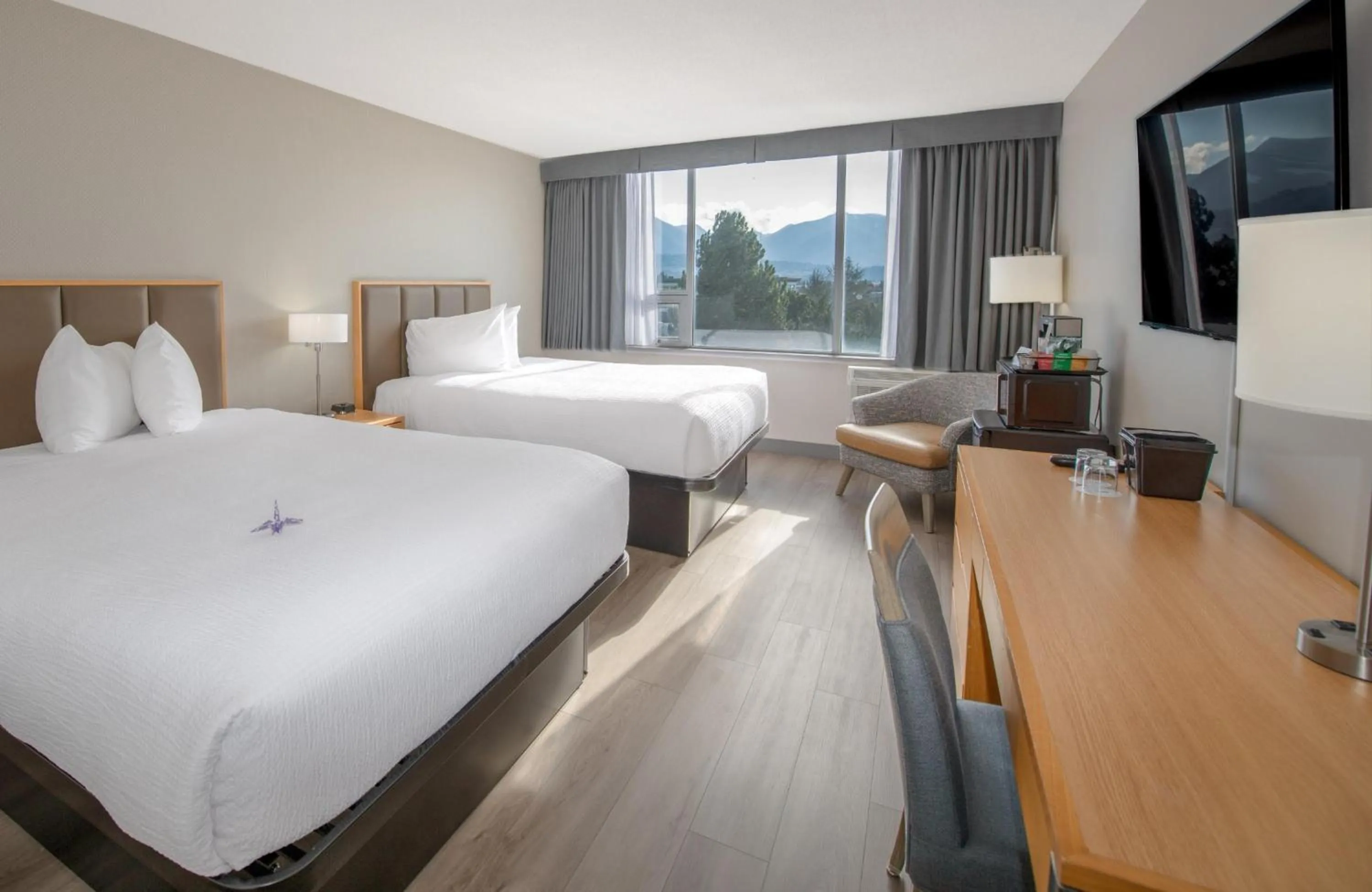 Bedroom, Bed in Coast Chilliwack Hotel by APA