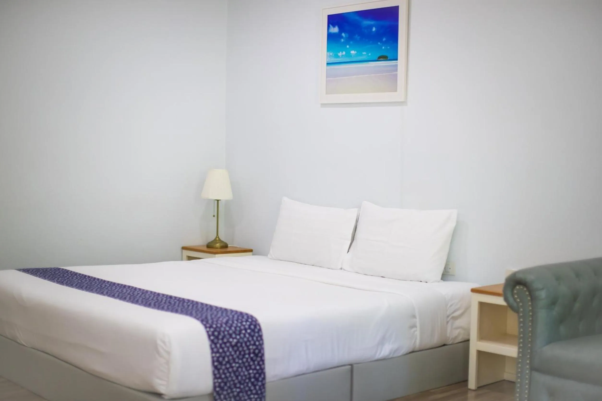 Bed in Blue Shore Cottage