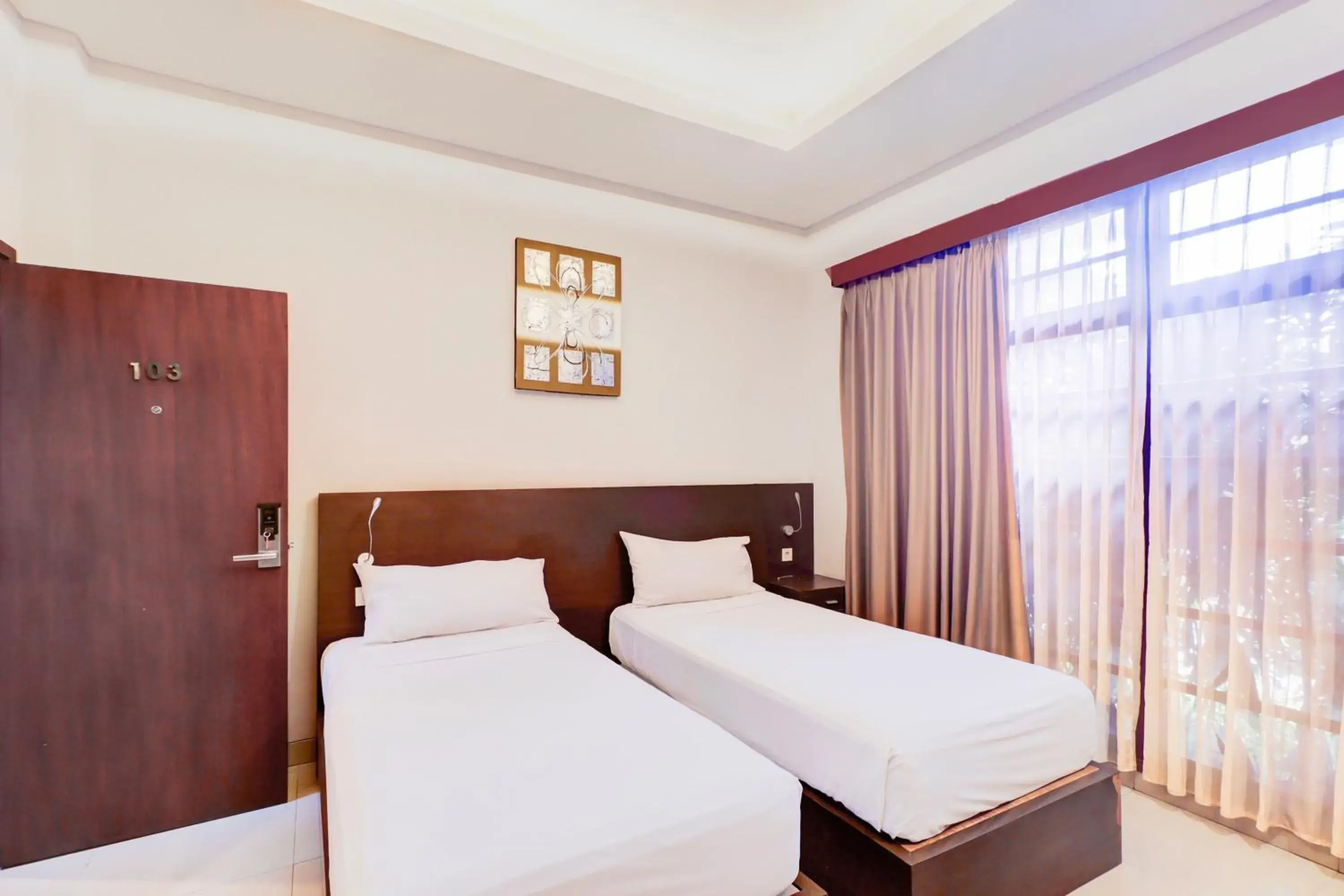 Deluxe Twin Room in Collection O Bali near Sanur Beach formerly Akarsa Transit Deluxe Twin Room in Collection O Bali near Sanur Beach formerly Akarsa Transit