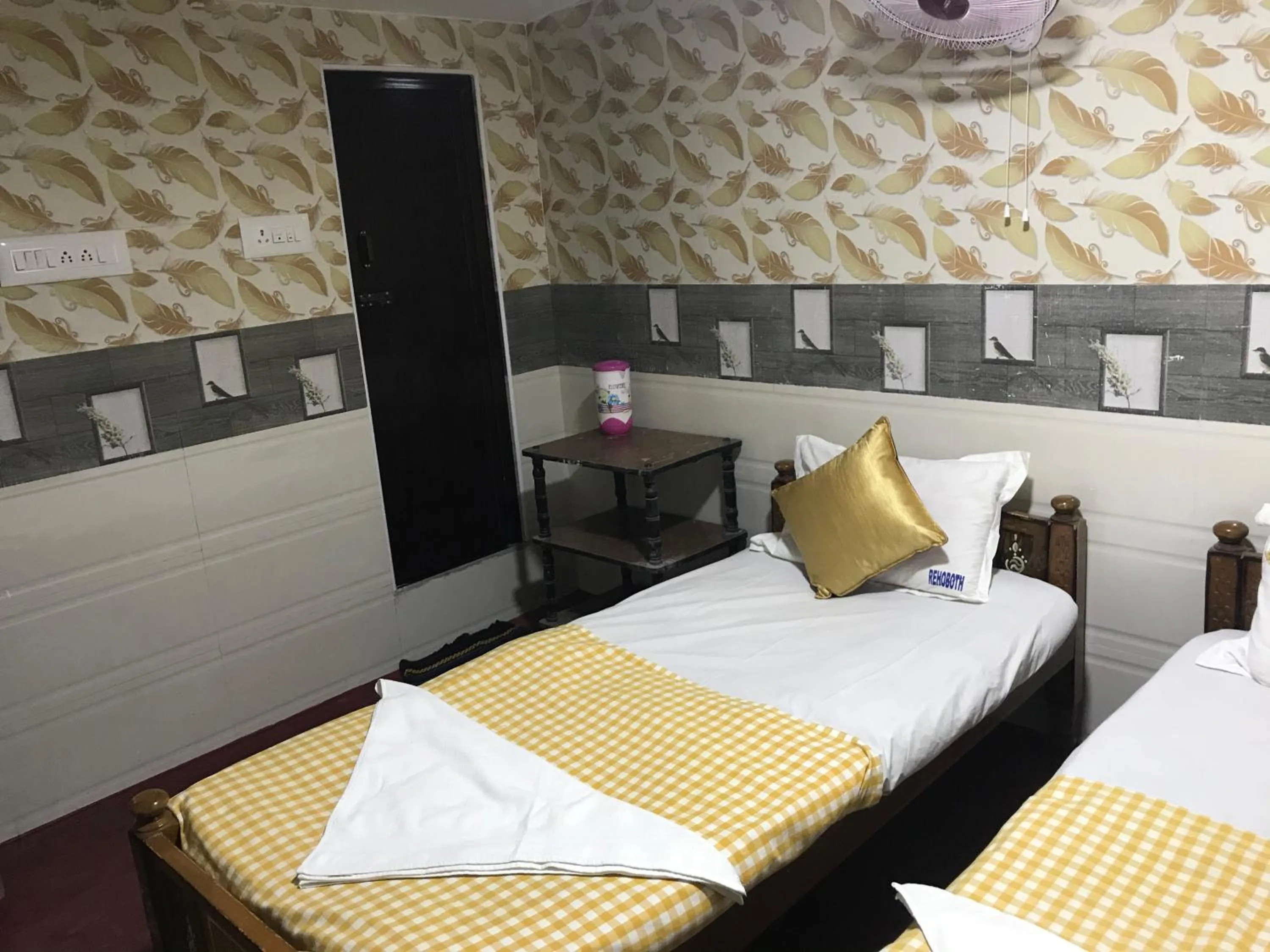 Bed in Rehoboth Home Stay