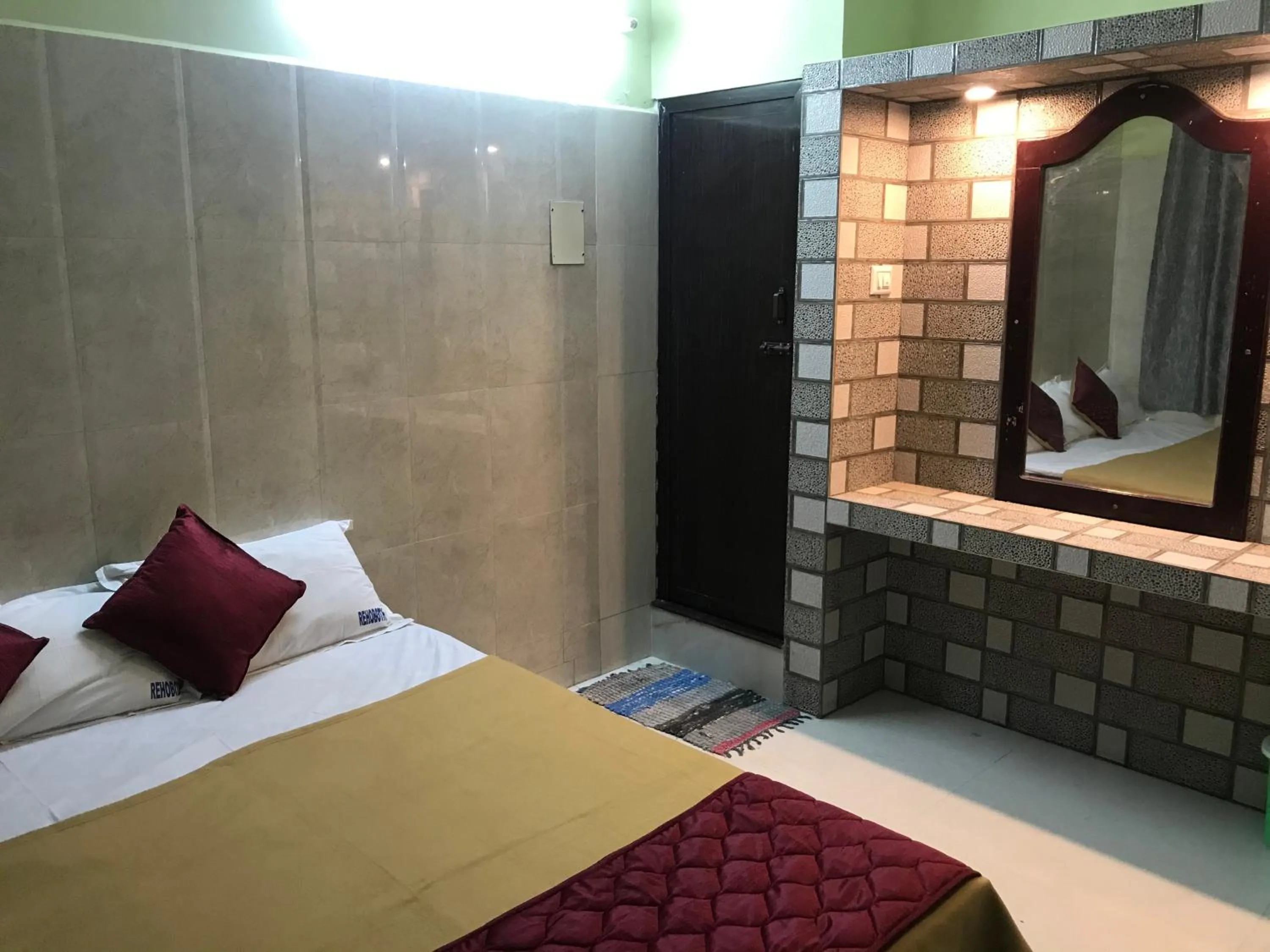 Bed in Rehoboth Home Stay