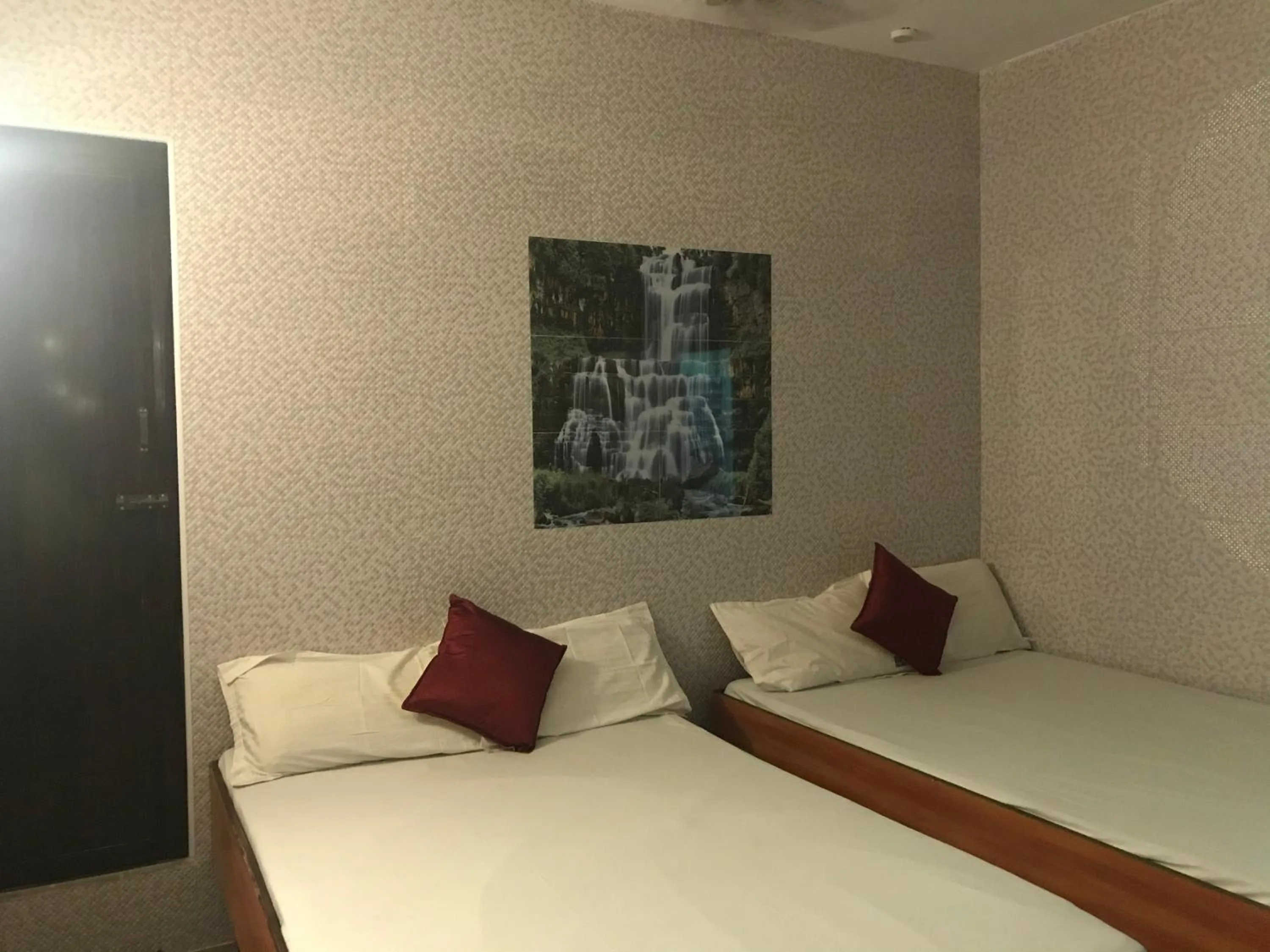 Bed in Rehoboth Home Stay