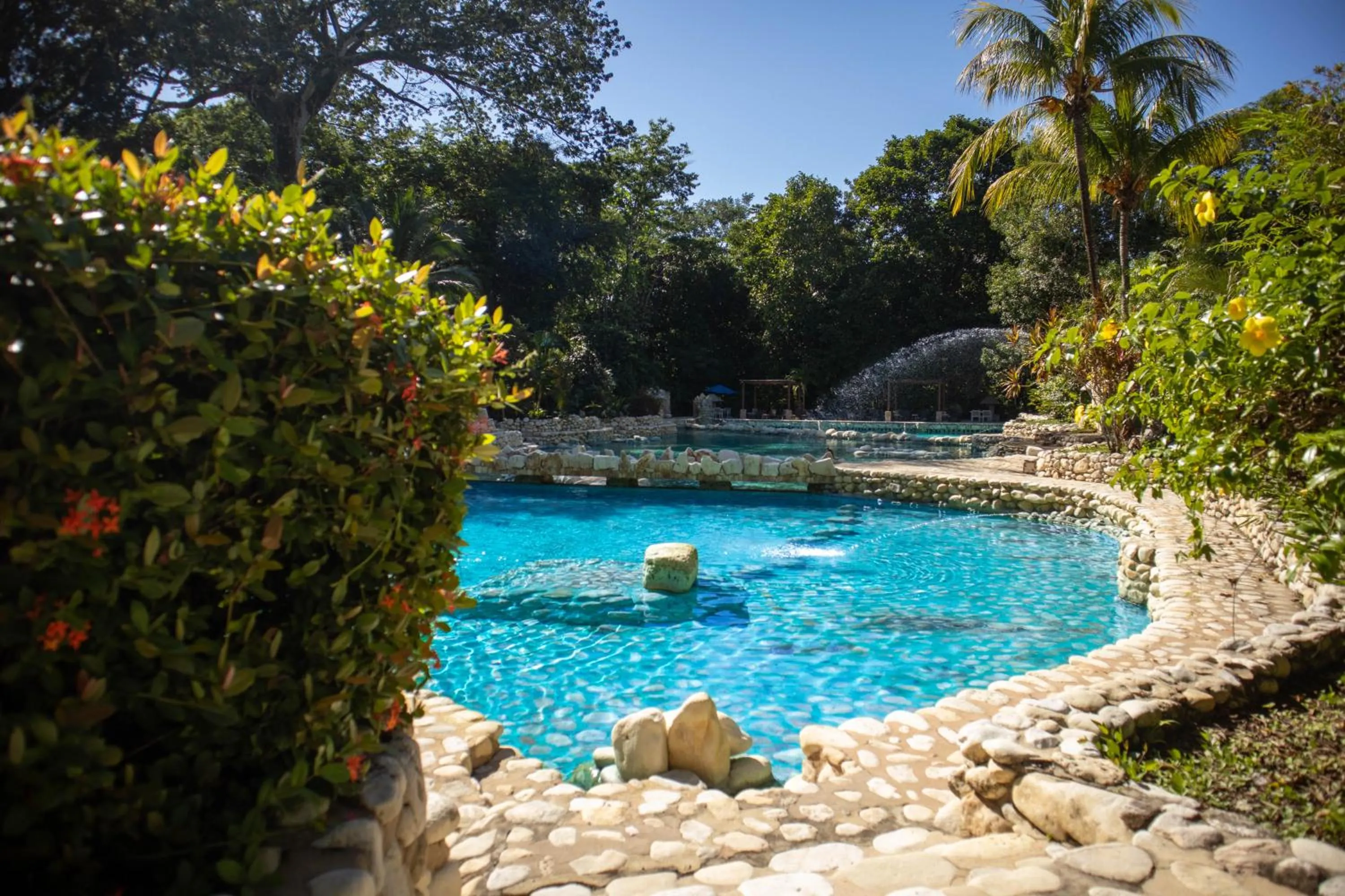 Swimming pool in Chan-Kah Resort Village