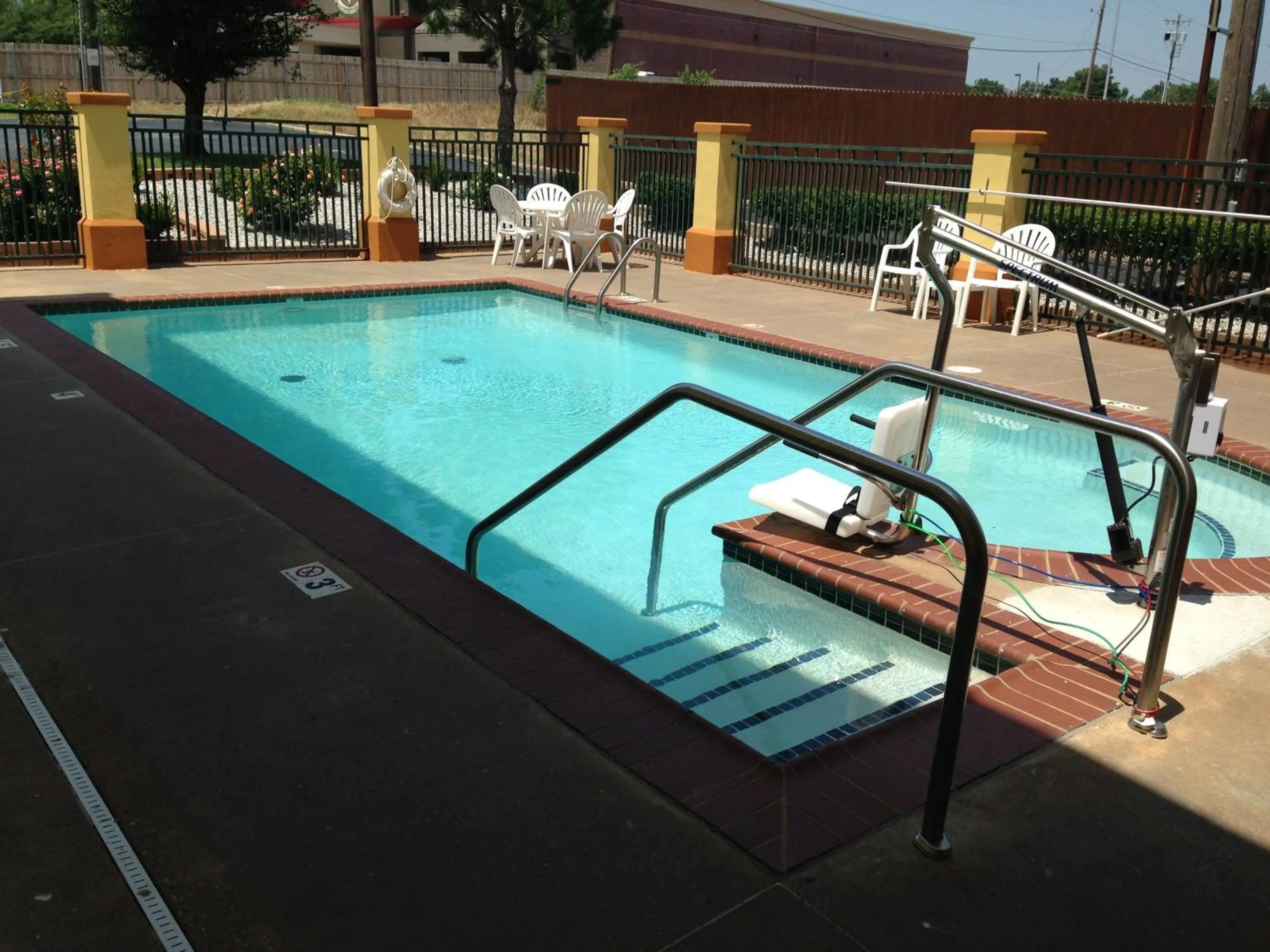 Swimming pool in Country Inn & Suites by Radisson, Oklahoma City at Northwest Expressway, OK
