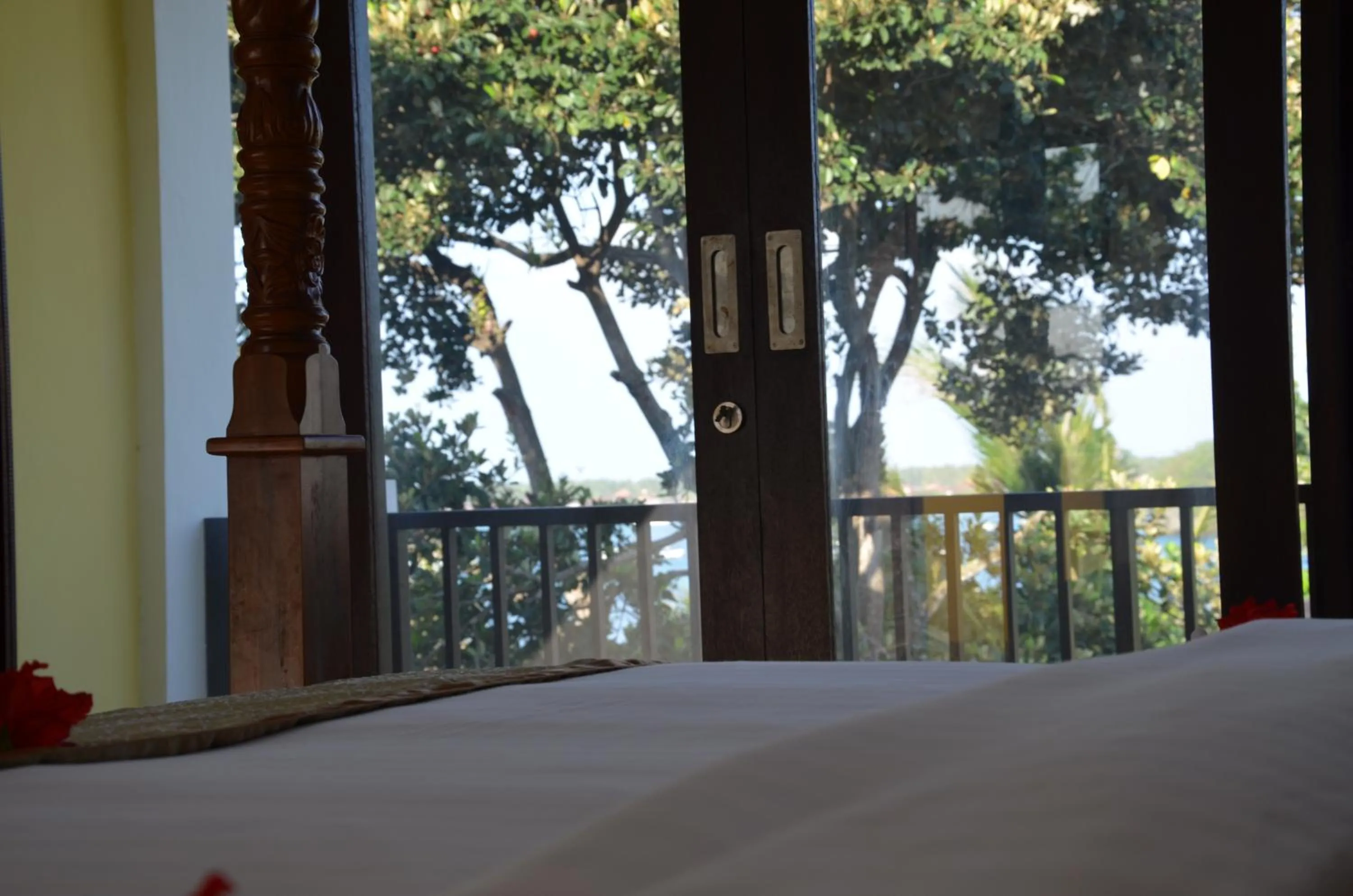 Bed in Tamarind Beach Bungalow