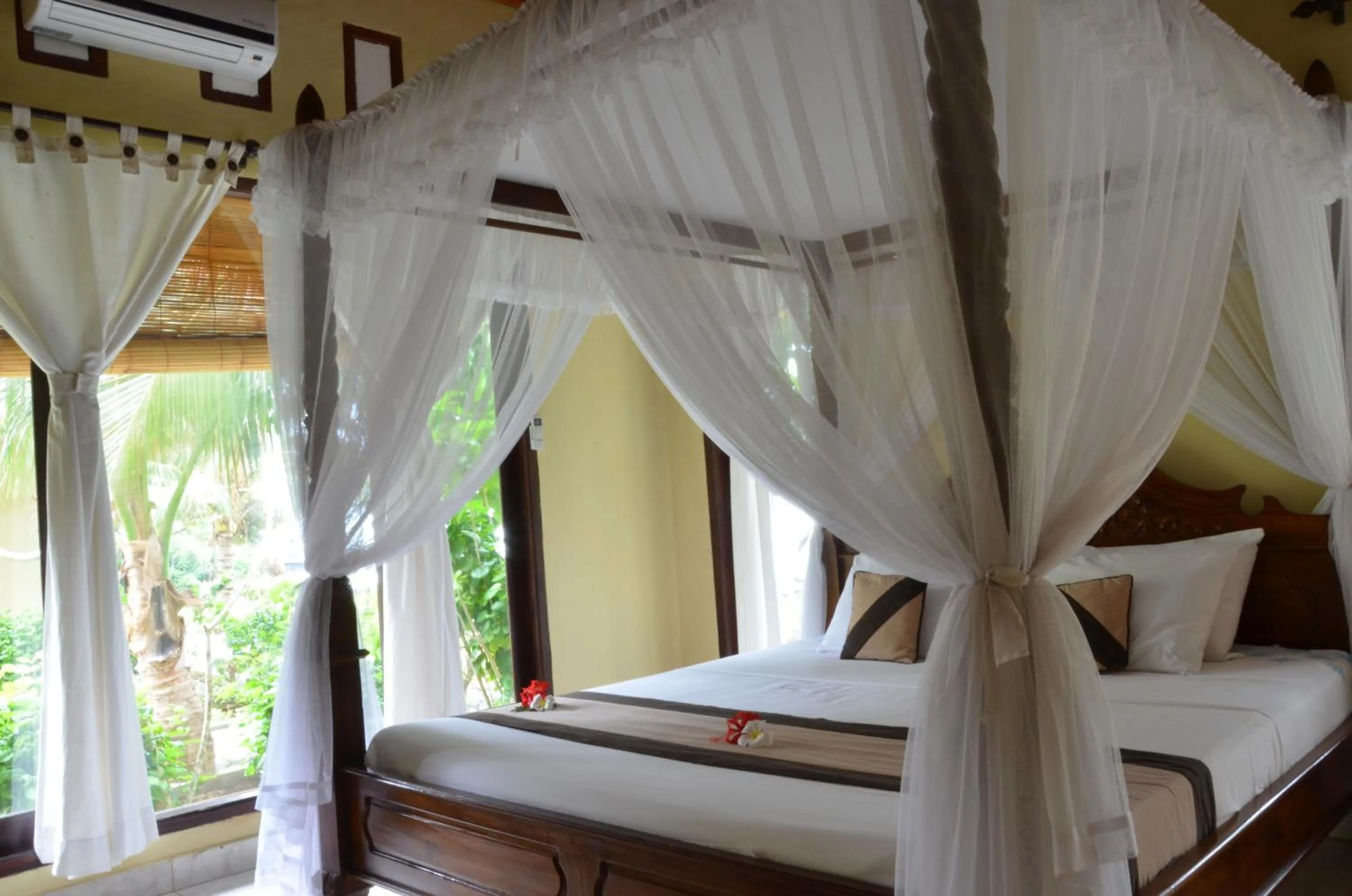Bed in Tamarind Beach Bungalow
