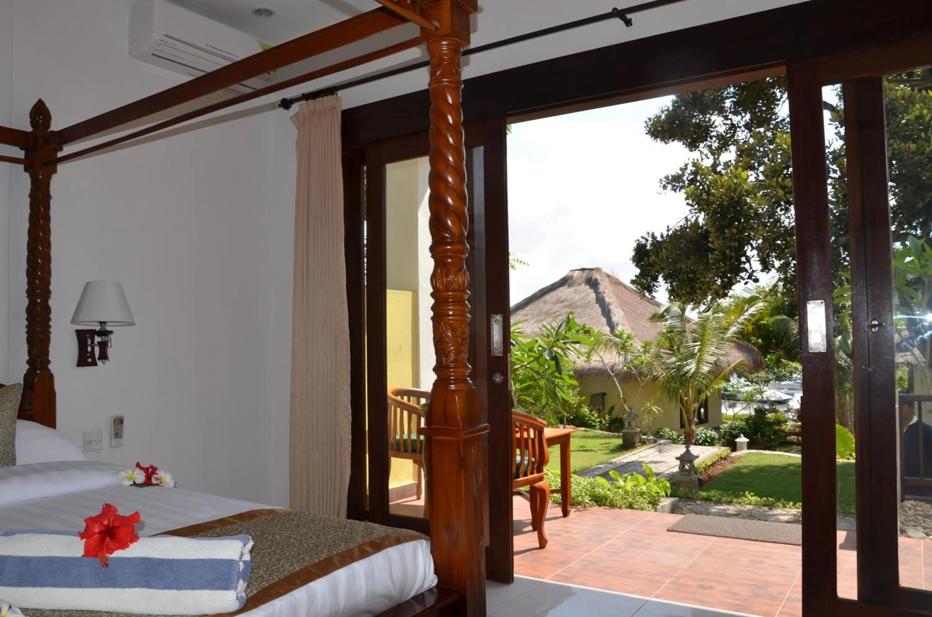Bed in Tamarind Beach Bungalow