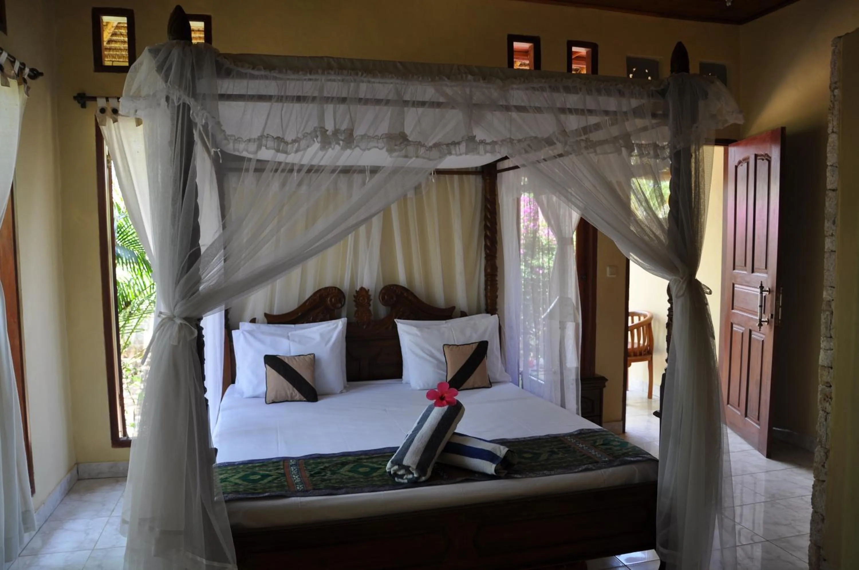 Bed in Tamarind Beach Bungalow