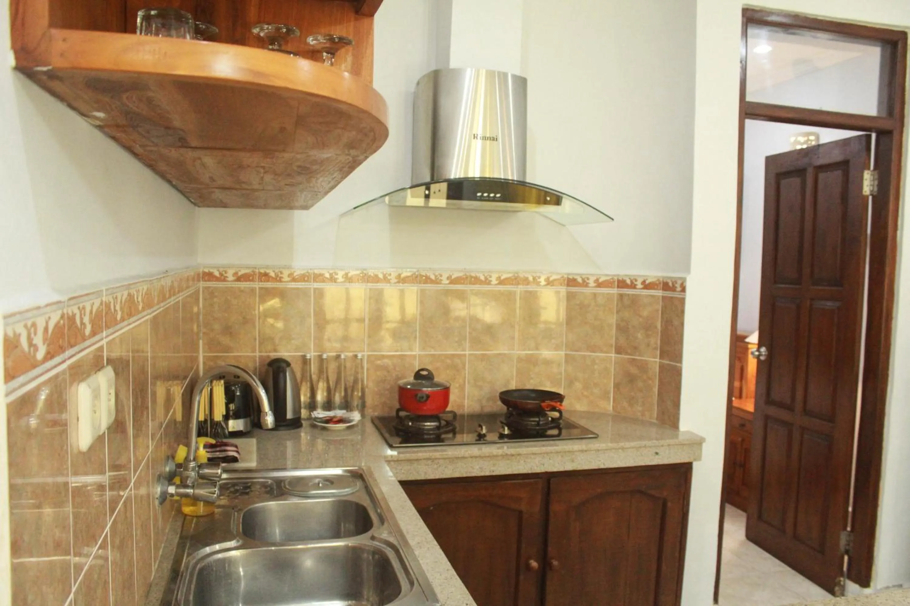 Kitchen or kitchenette in Bali Palms Resort