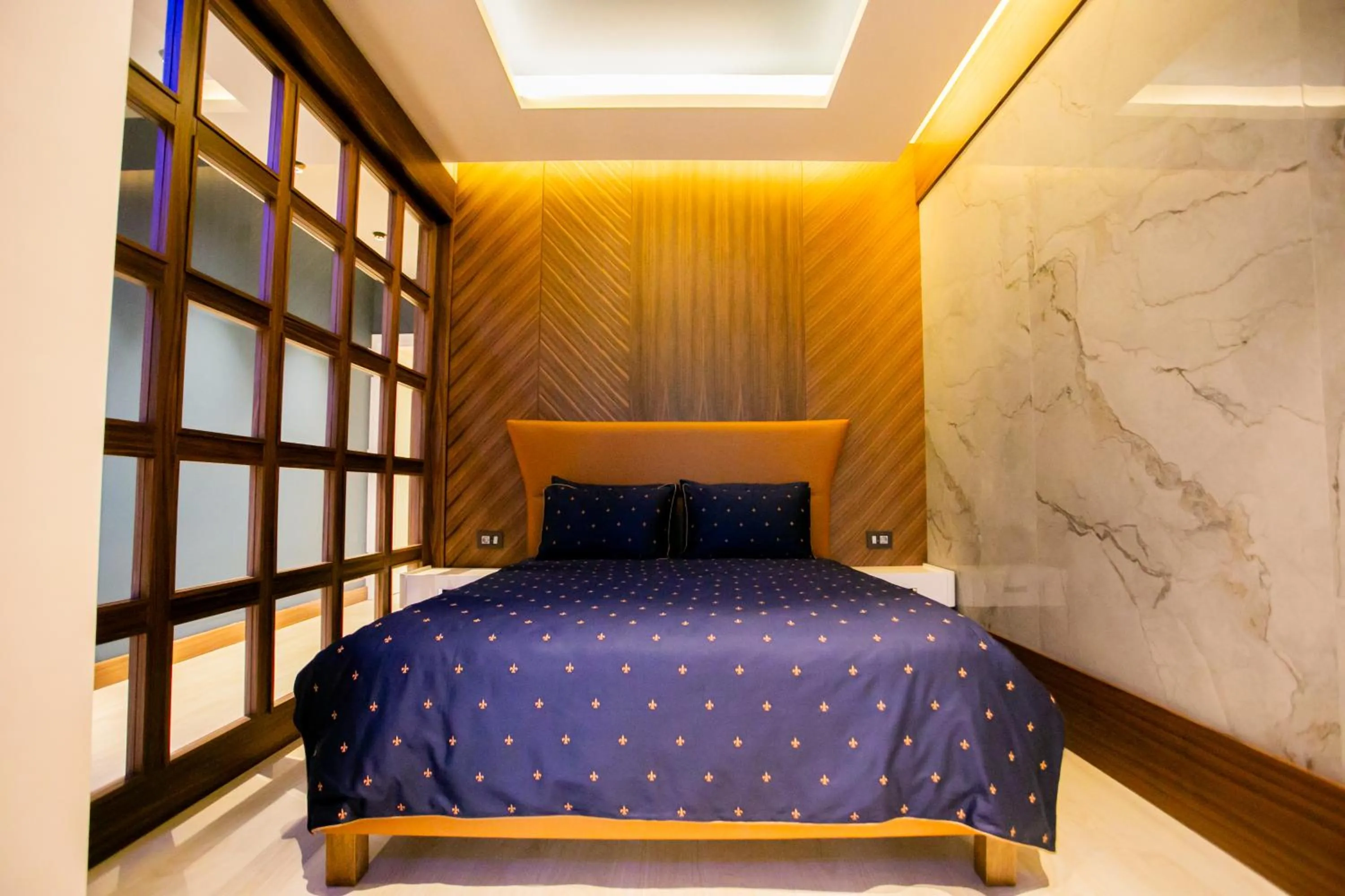 Bed in Lalila Blue Suites