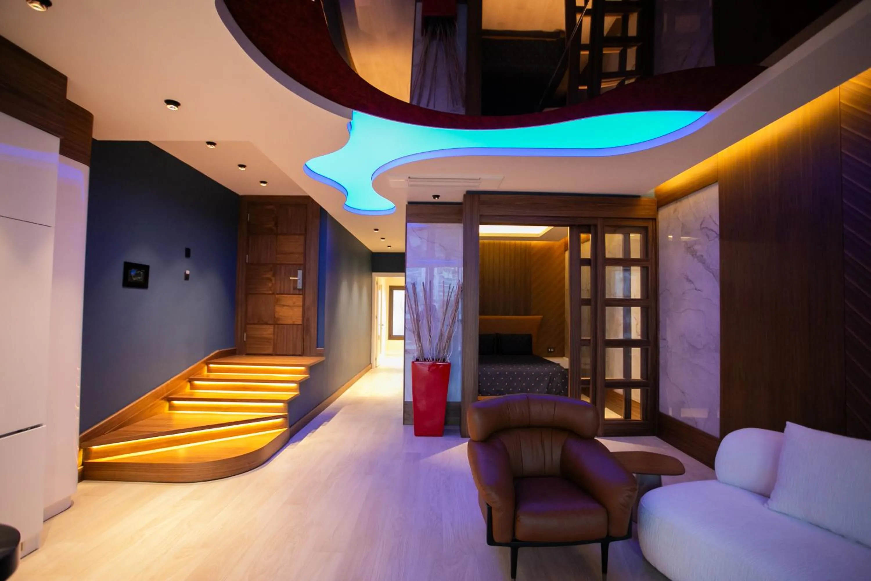 Living room, Bed in Lalila Blue Suites