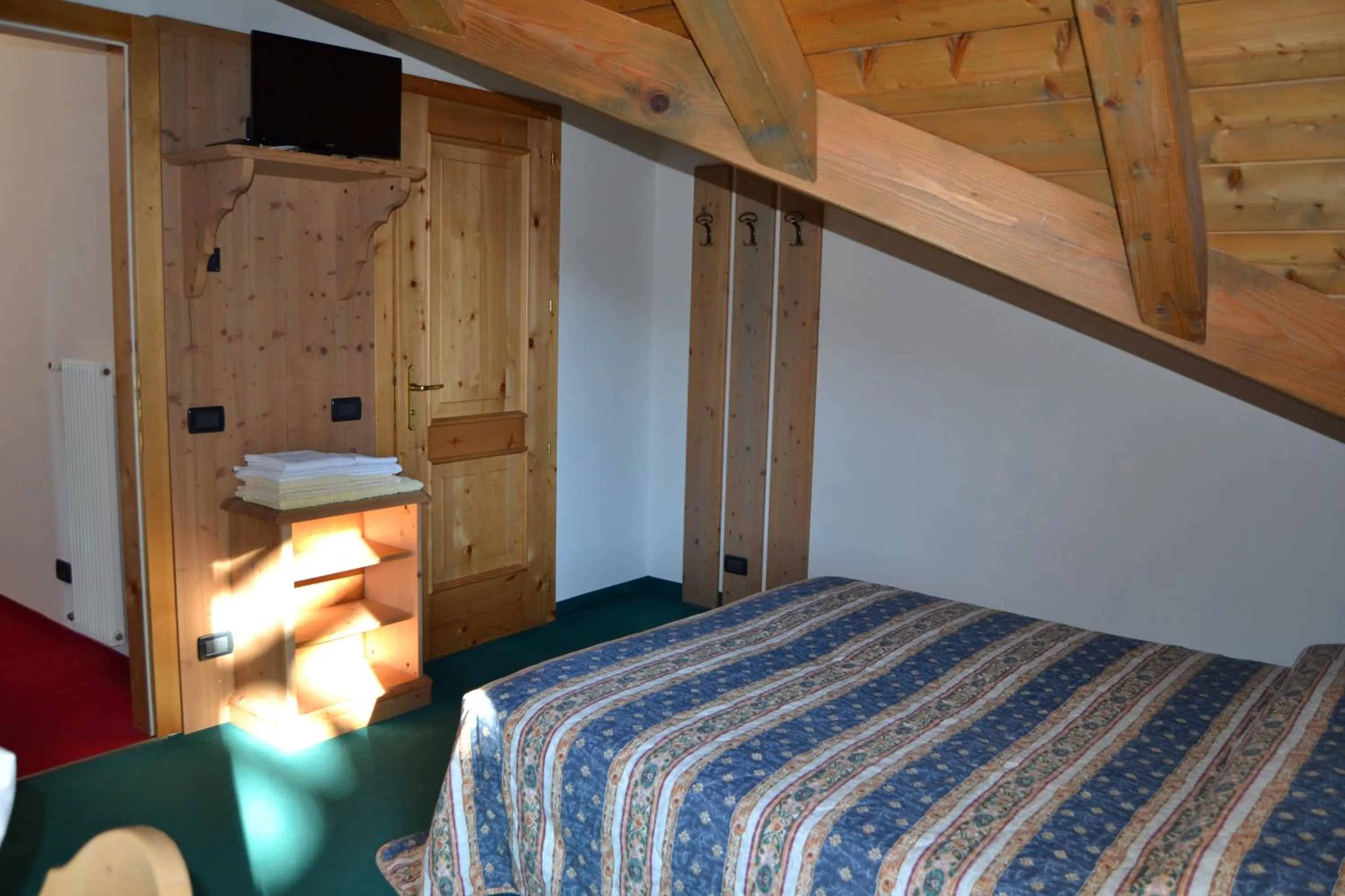 Decorative detail, Bed in Giongo Residence - Appartamenti