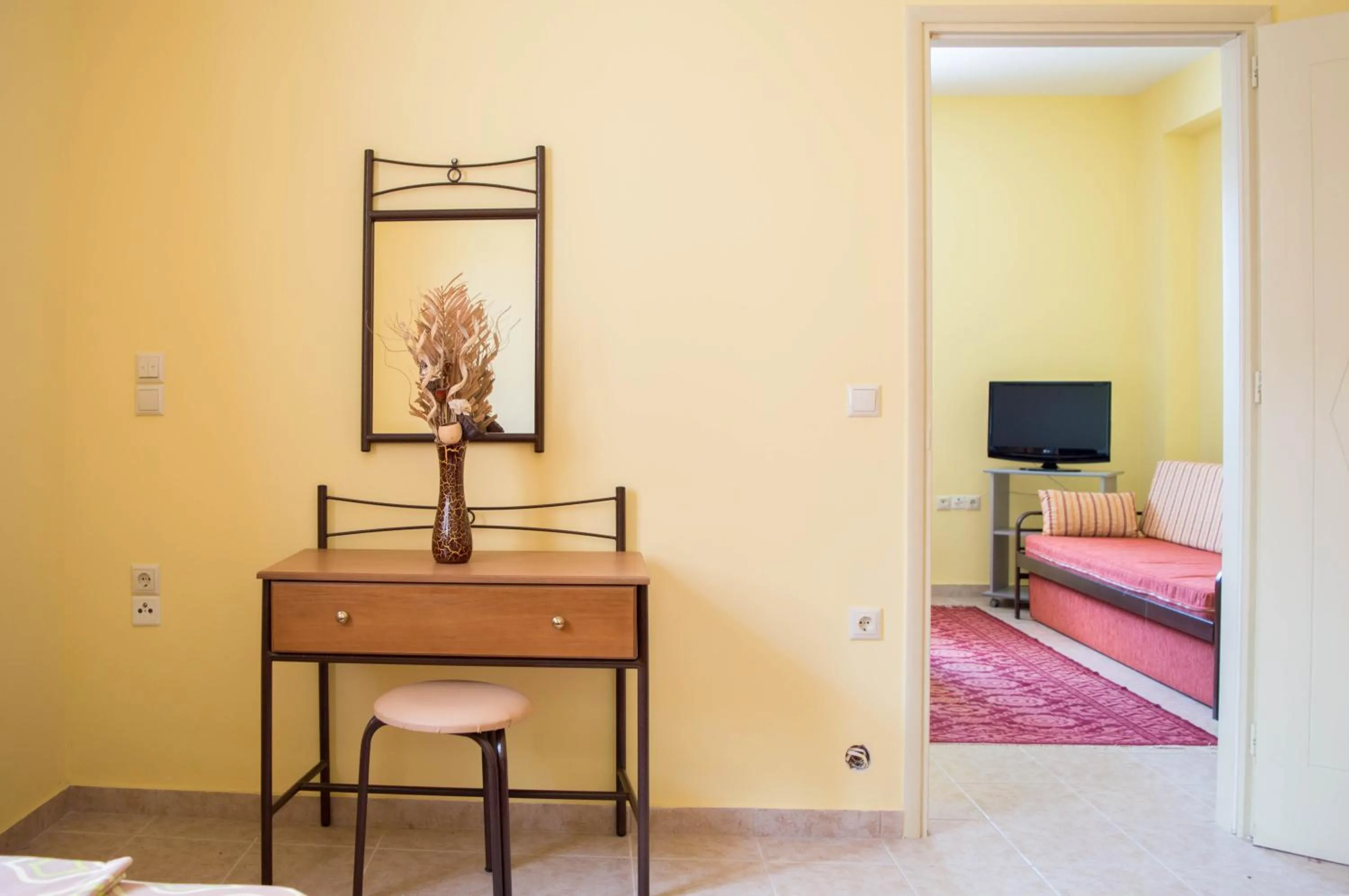 Bed in Manesi Apartments