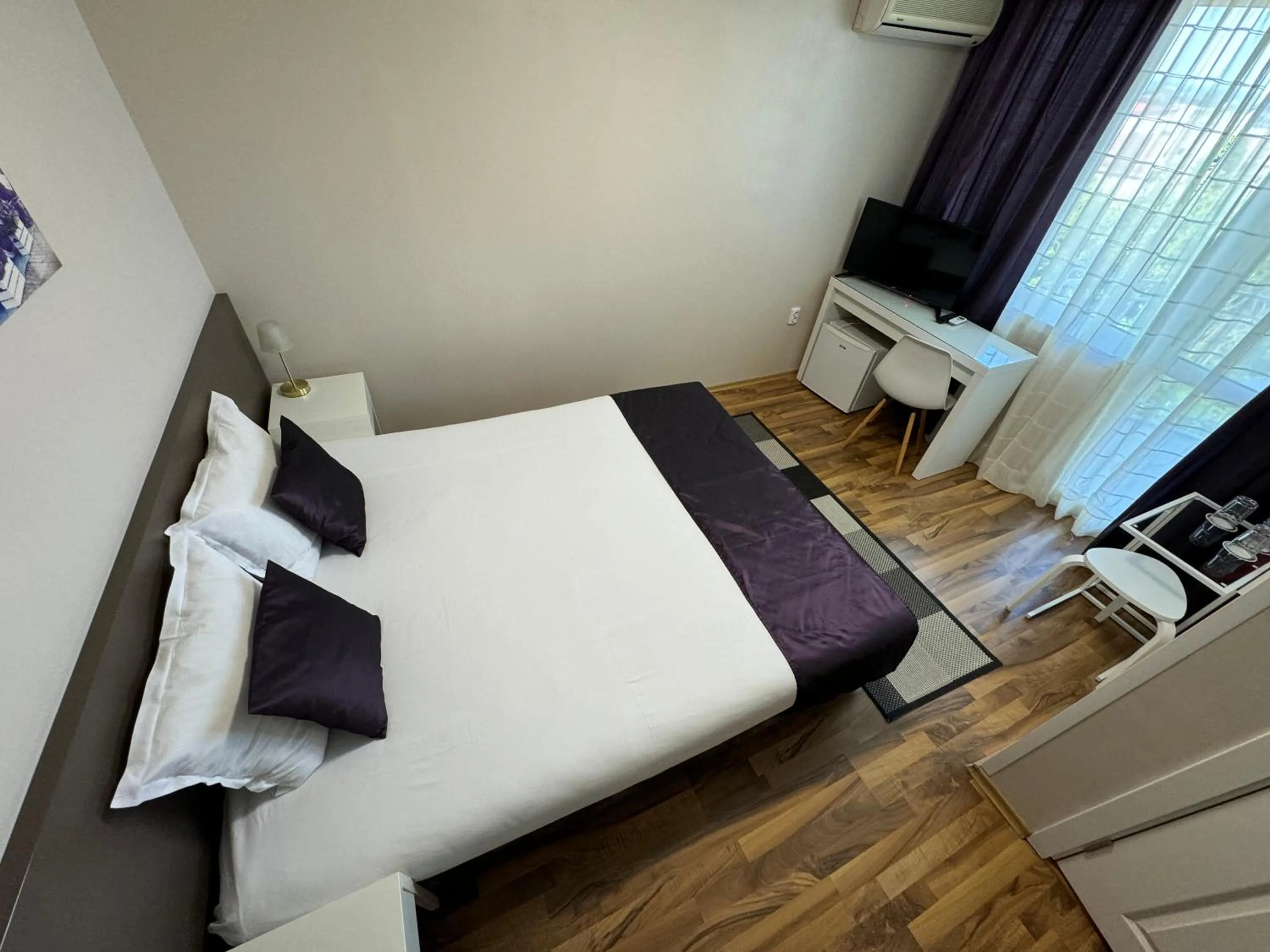 Bed in Hotel Amfora