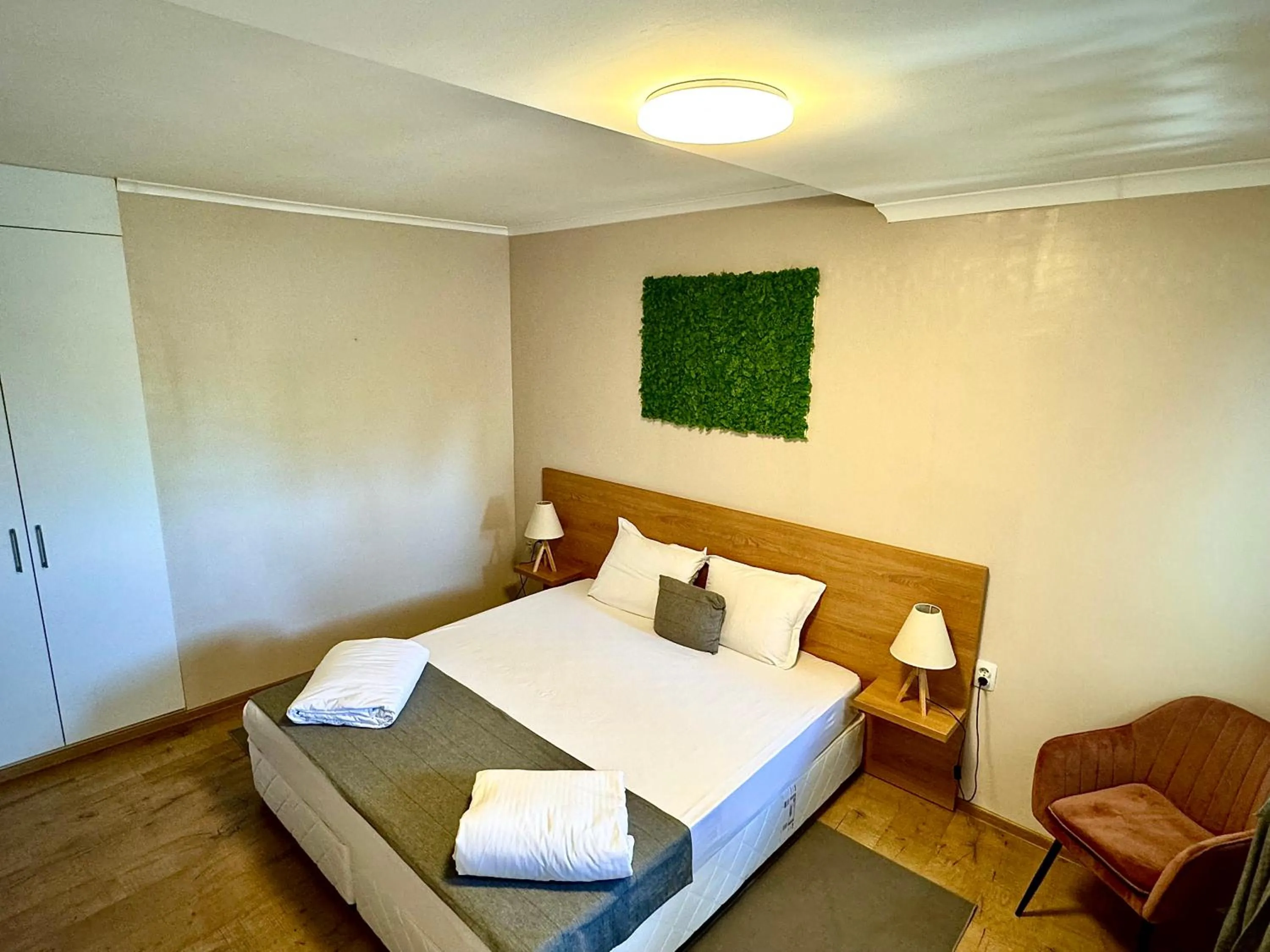 Bed in Hotel Amfora