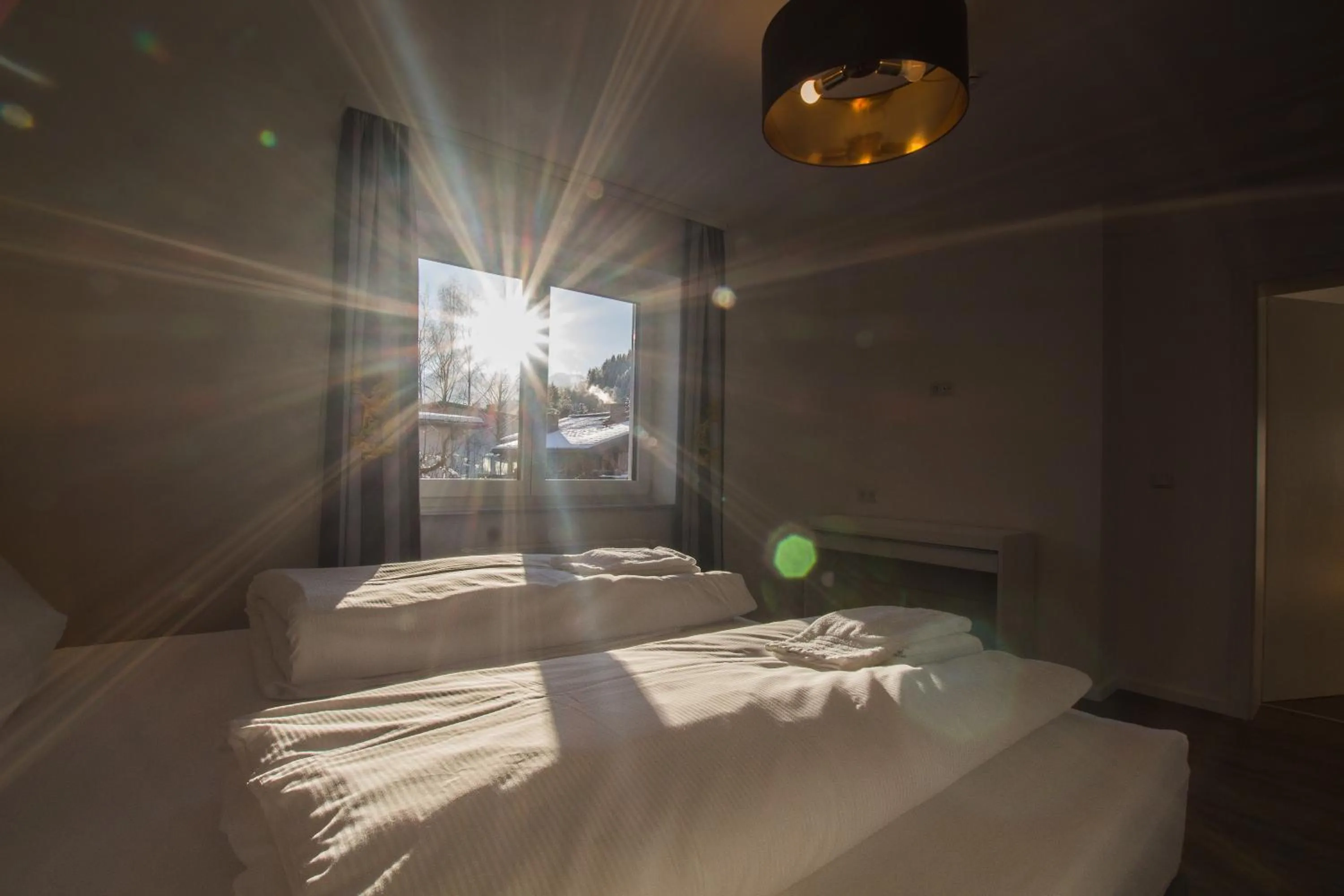 Bed in Panorama Apartments - Steinbock Lodges