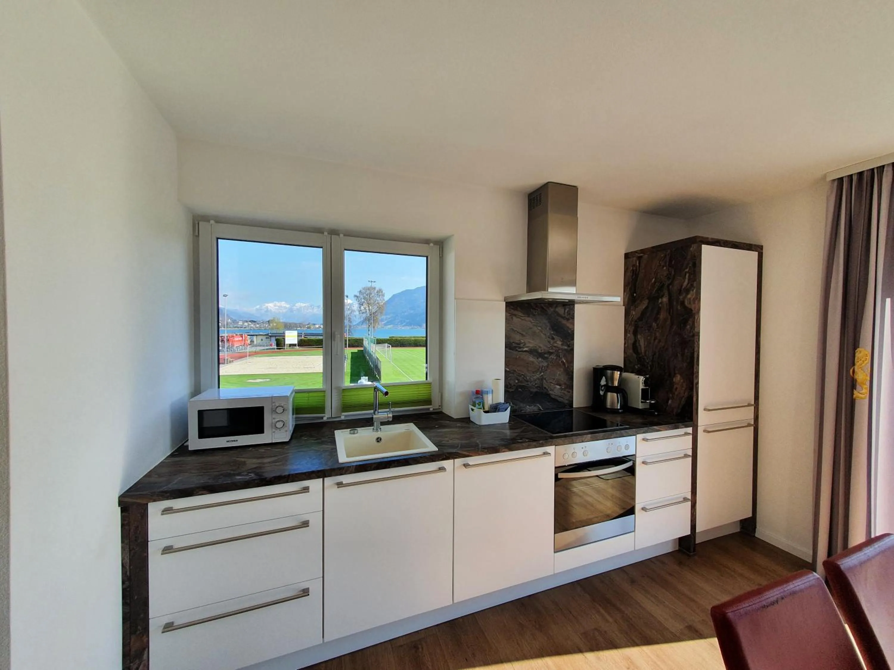 Kitchen or kitchenette in Panorama Apartments - Steinbock Lodges