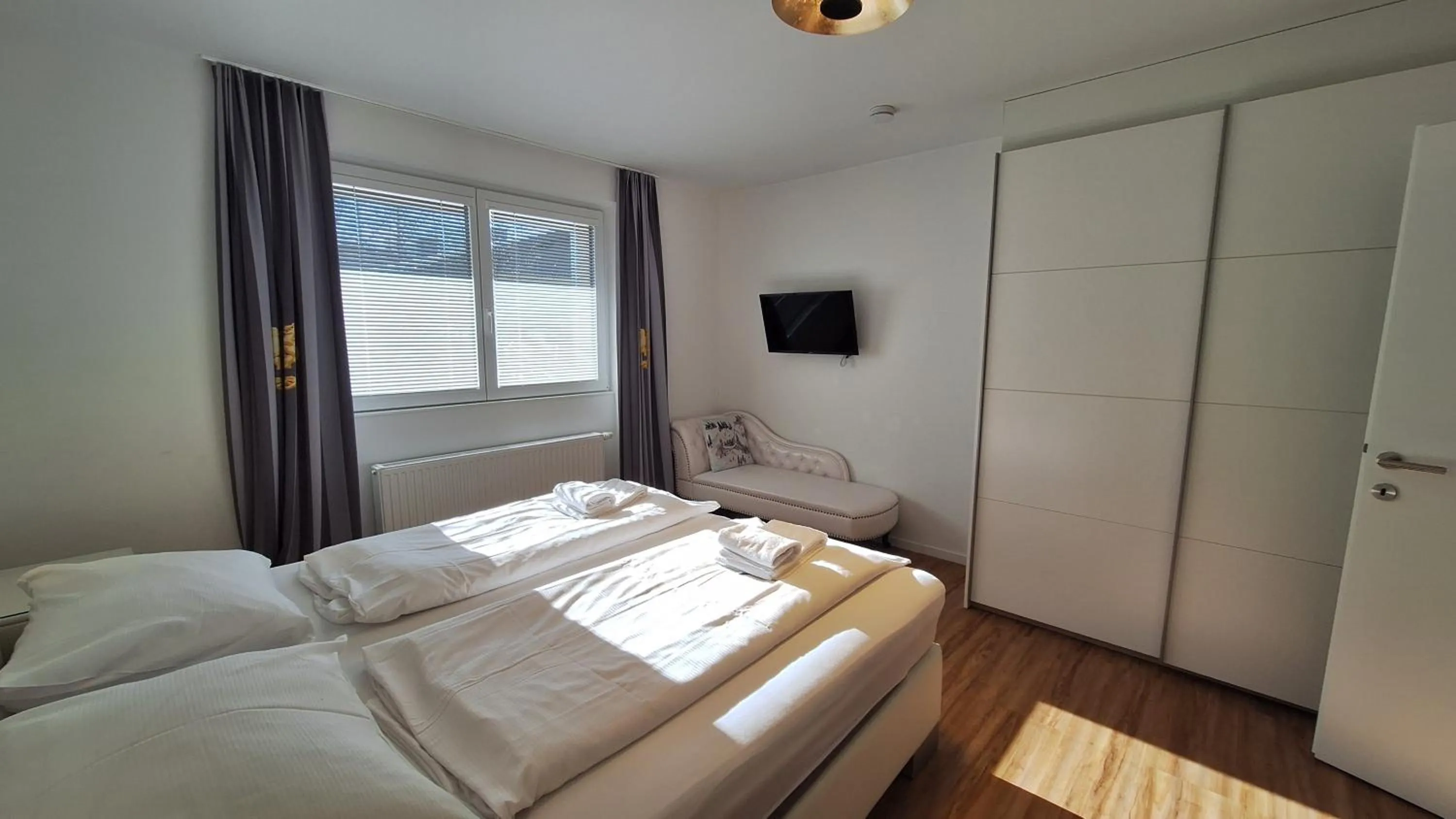 Bed in Panorama Apartments - Steinbock Lodges