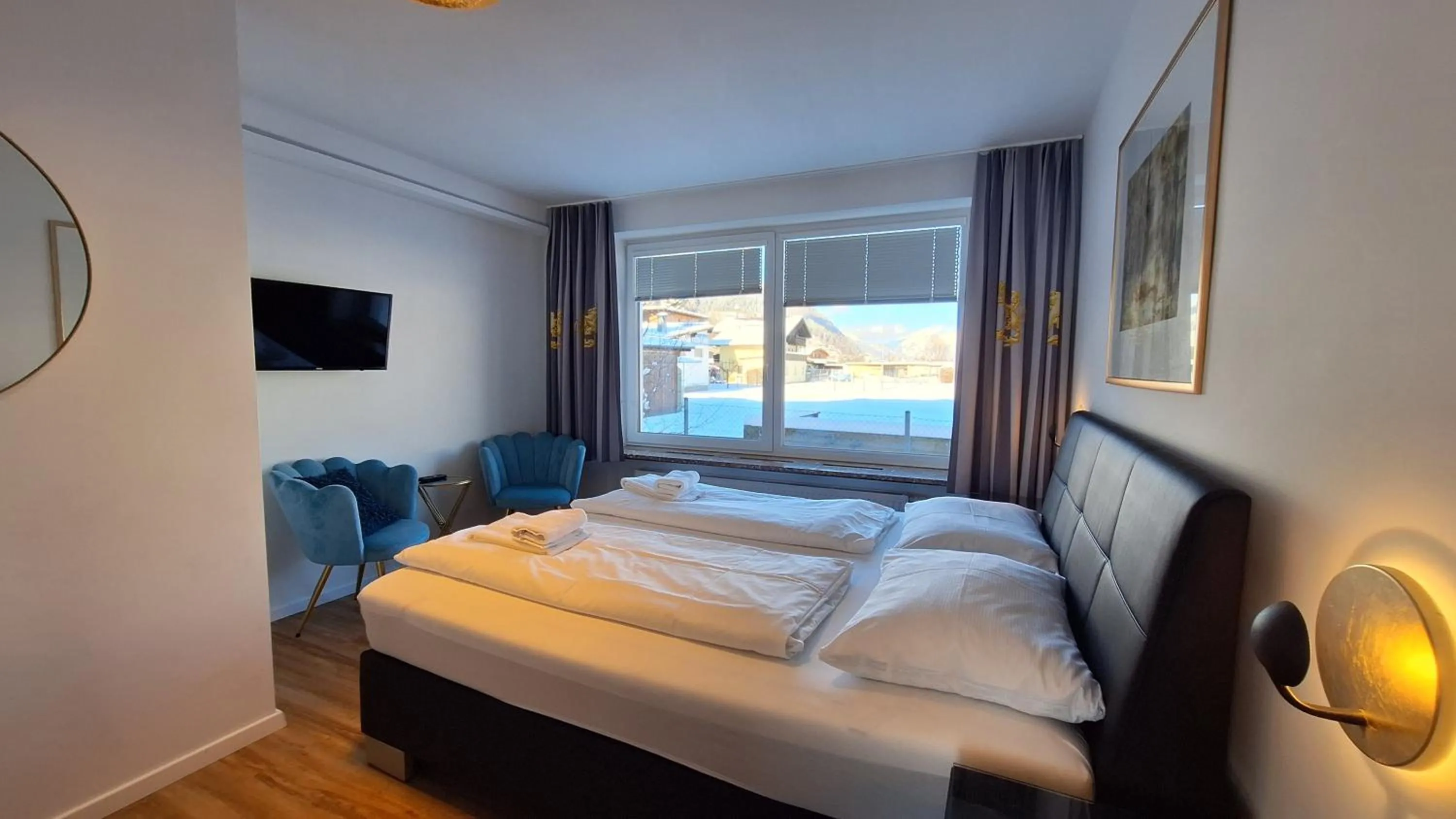 Bed in Panorama Apartments - Steinbock Lodges